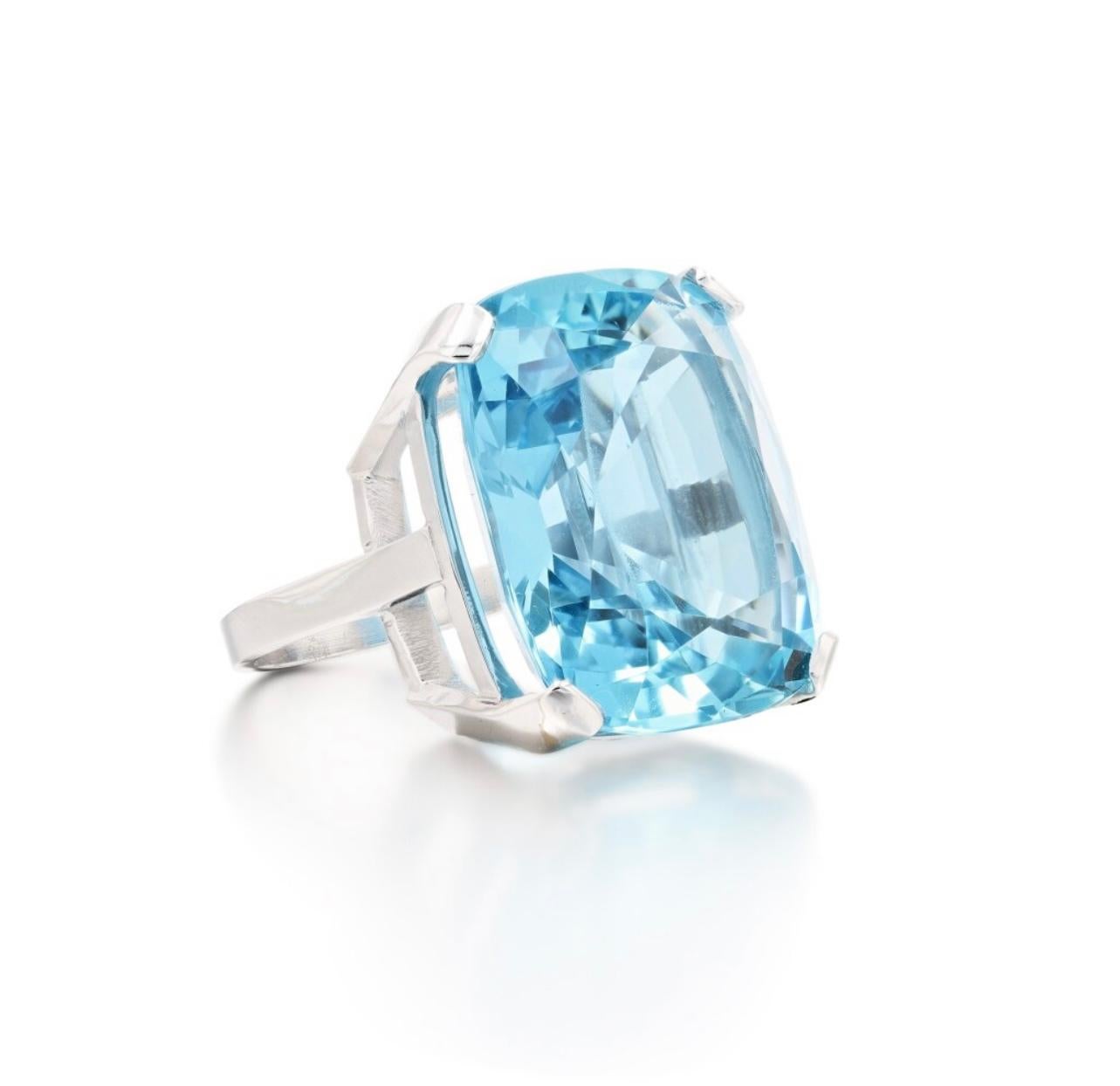 White gold ring set with an exceptional cushion-cut Santa-Maria aquamarine weighing 39.24 carats.

Aquamarine weight: 39.24 carats

With Carat Gem Lab certificate, specifying Natural Aquamarine, Santa-Maria colour.

No visible inclusions.

The