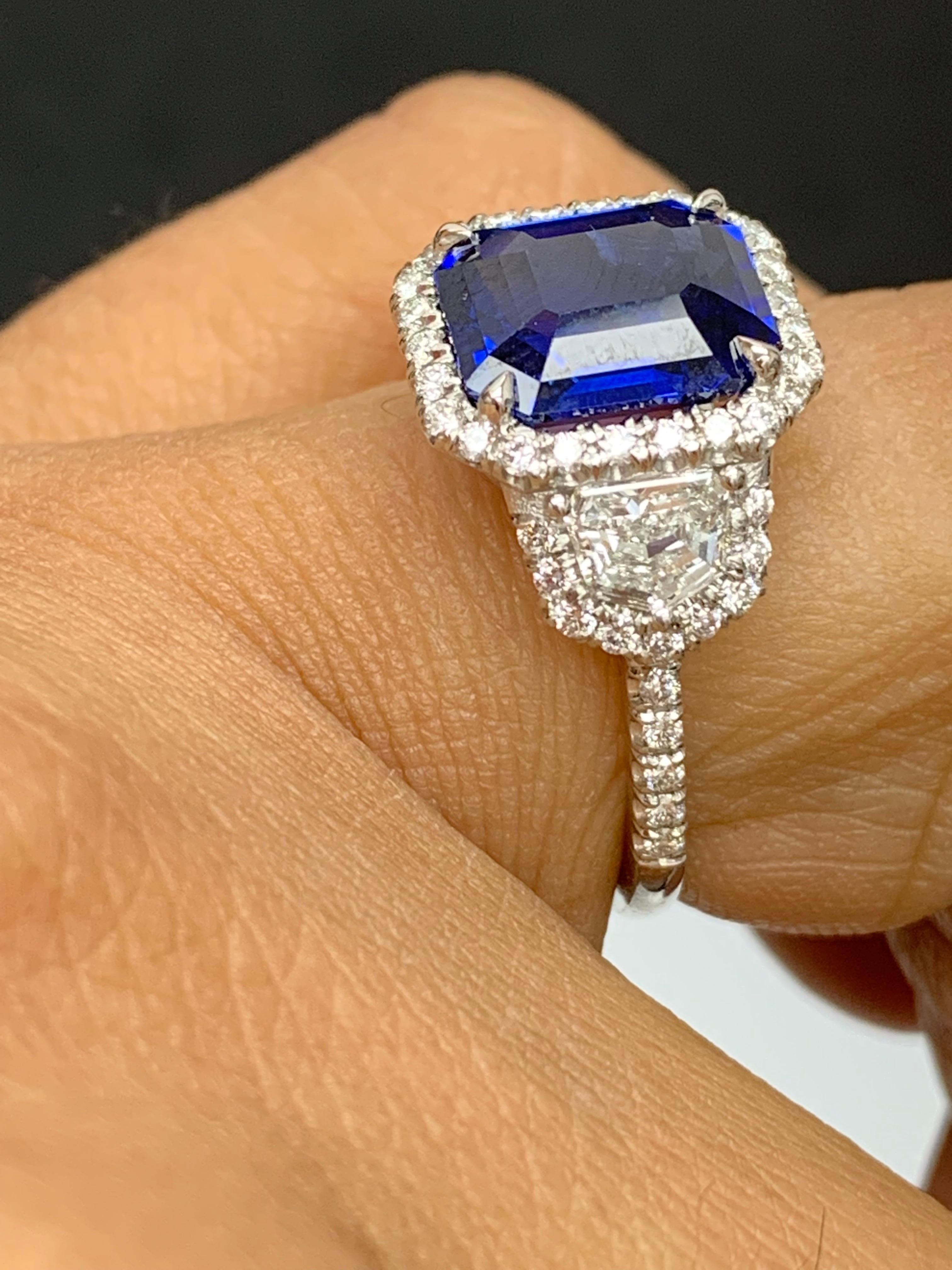Women's Certified 4.07 Carat Emerald Cut Sapphire Diamond 3 Stone Halo Ring in Platinum For Sale