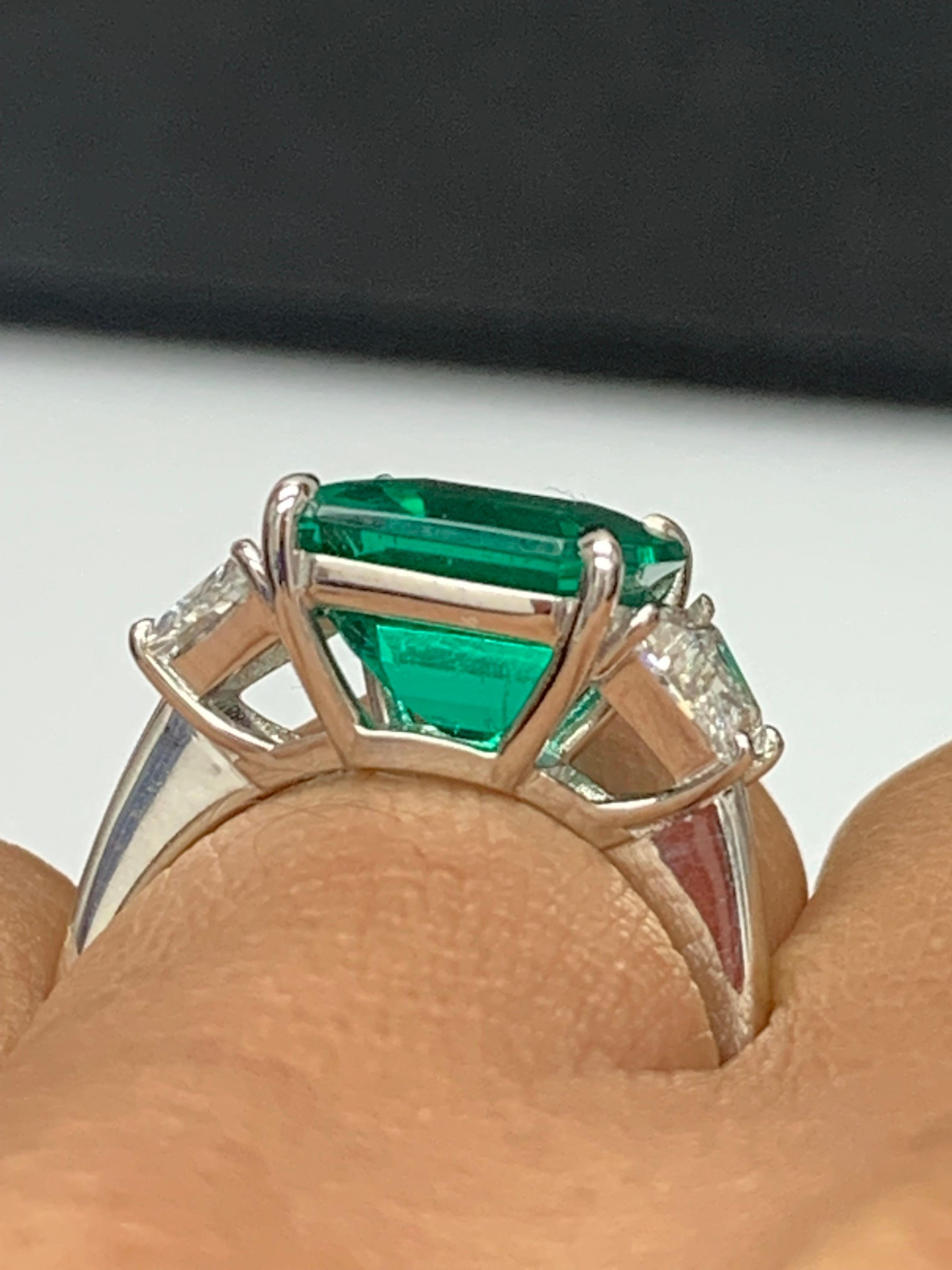 Certified 4.26 Carat Emerald Cut Emerald and Diamond 3 Stone Engagement Ring For Sale 9