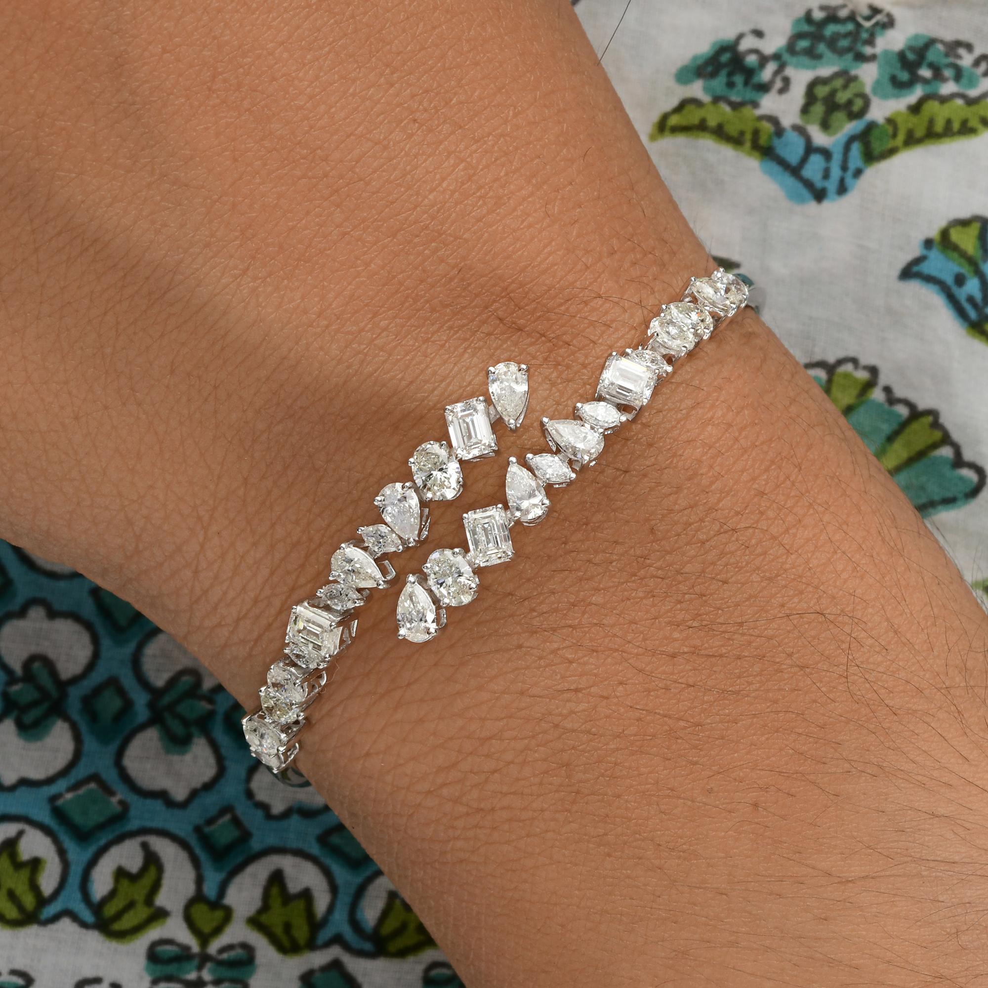 Certificado 4.28Ct Multi Shape Diamond Bypass Pulsera Puño Joyería de Oro Blanco de 18k
Este brazalete presenta un moderno diseño de puño abierto, bellamente engastado con diamantes de formas mixtas -marquesa, pera, oval y esmeralda- para un aspecto