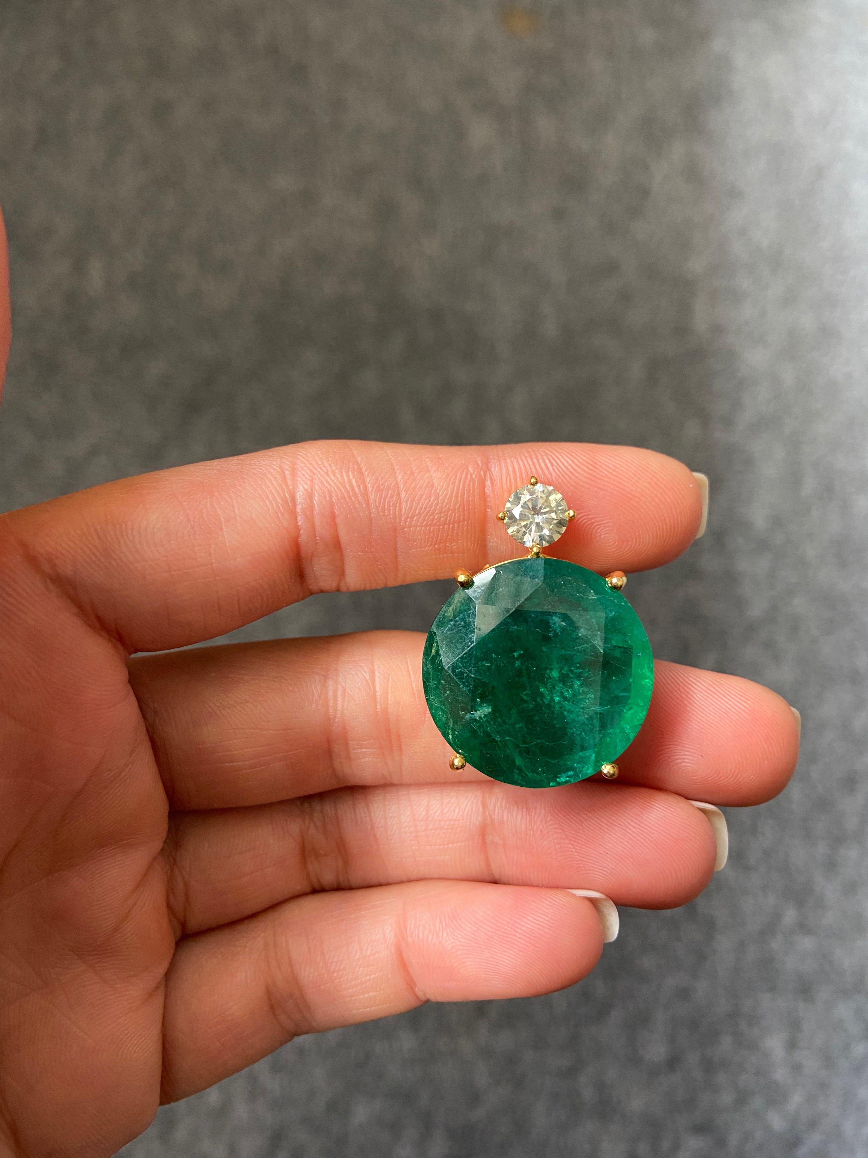 round emerald dangle earrings