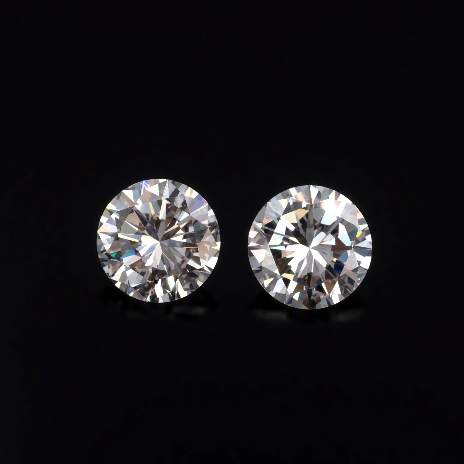 Beautifully large stud earrings: A very well-matched couple of diamonds weighing respectively 2.26 and 2.25 carat, both I VVS2, set on 18 Karat white gold stud earrings. The diamonds look incredibly white (more than the average I color ) and