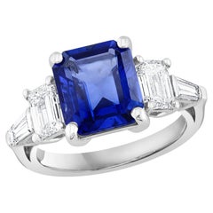Certified 4.74 Carat Emerald Cut Sapphire and Diamond Five-Stone Engagement Ring