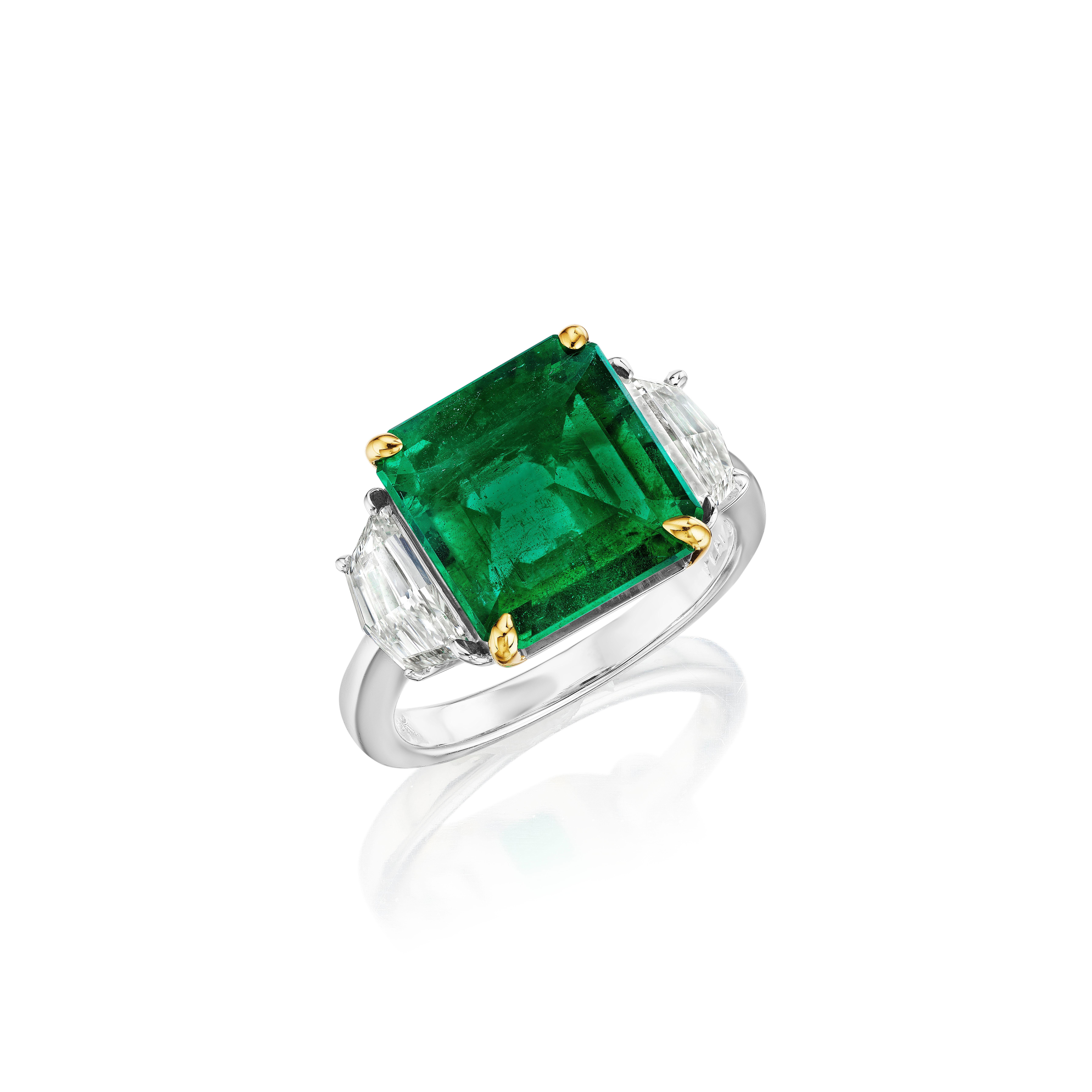 •	Platinum & 18KT Two Tone
•	5.91 Carats
•	Size 6.5

•	Number of Emeralds: 1
•	Carat Weight: 4.75ctw
•	Color: Vivid green- Natural Beryl
•	Certificate: CDC1706550
•	Moderate Clarity Enhancement

•	Number of Cadillac Diamonds: 2
•	Carat Weight:
