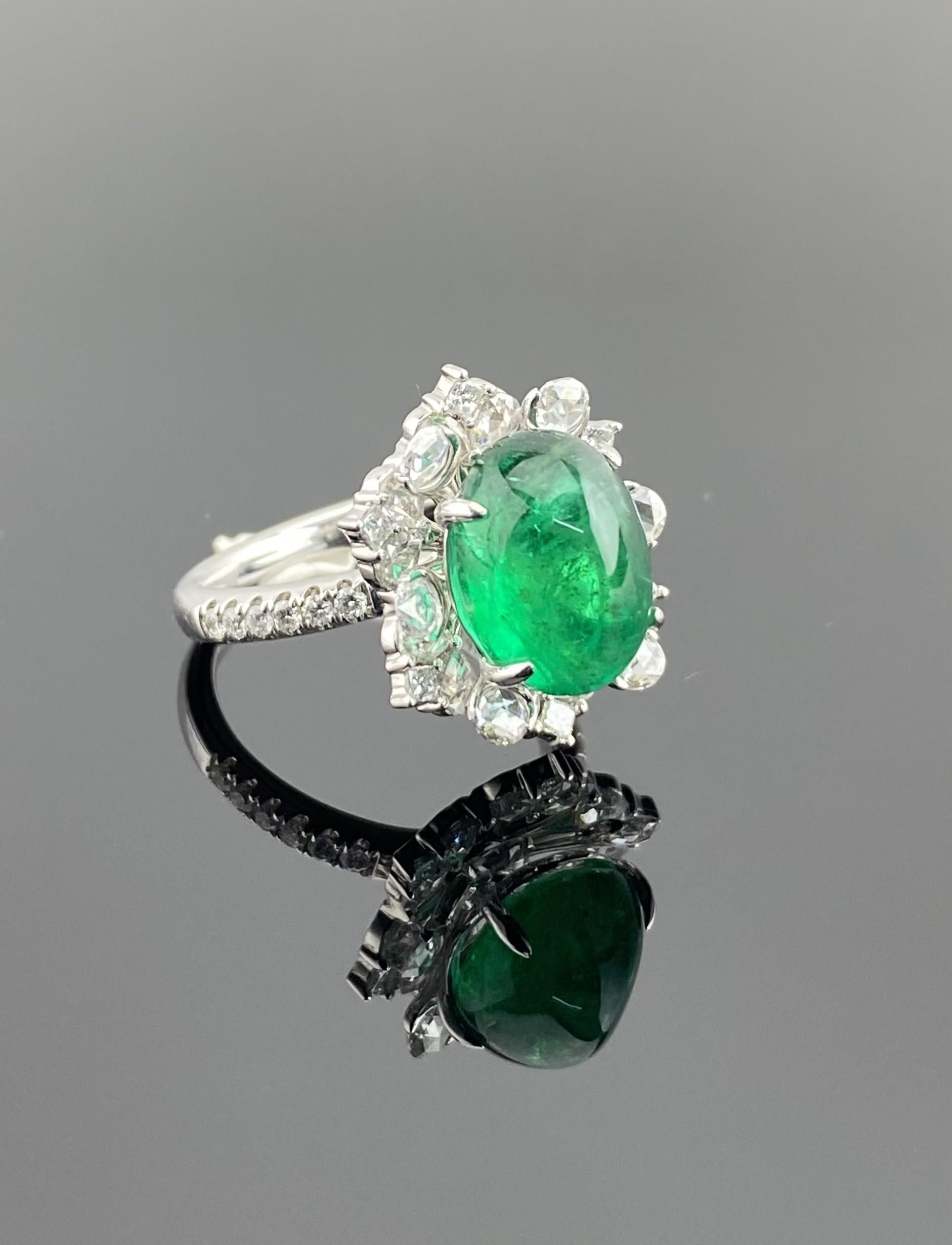Make a statement with this certified 4.78 carat natural Zambian Emerald and rose cut and full cut 1.30 carat Diamond cocktail ring. The Emerald cabochon is of high quality, transparent and impeccable vivid green color, and VS quality White Diamonds