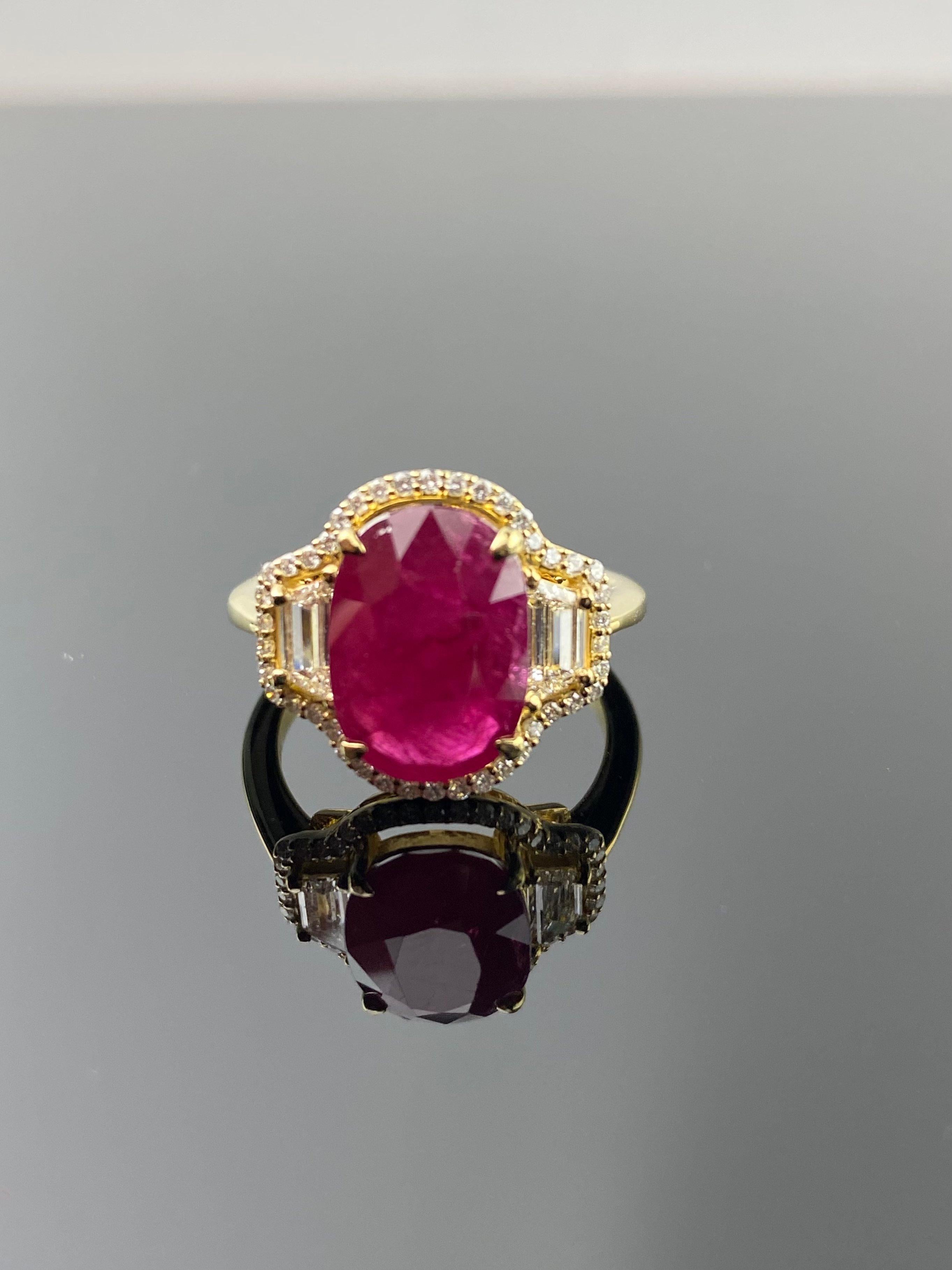 A spectacular oval shaped red heated Burma Ruby commands attention in this extraordinary 18K yellow gold ring. The stoplight-red ruby weighs 4.94 carats, two sleek trapezoid diamonds weighing 0.37 carats, surrounded by smaller round brilliant