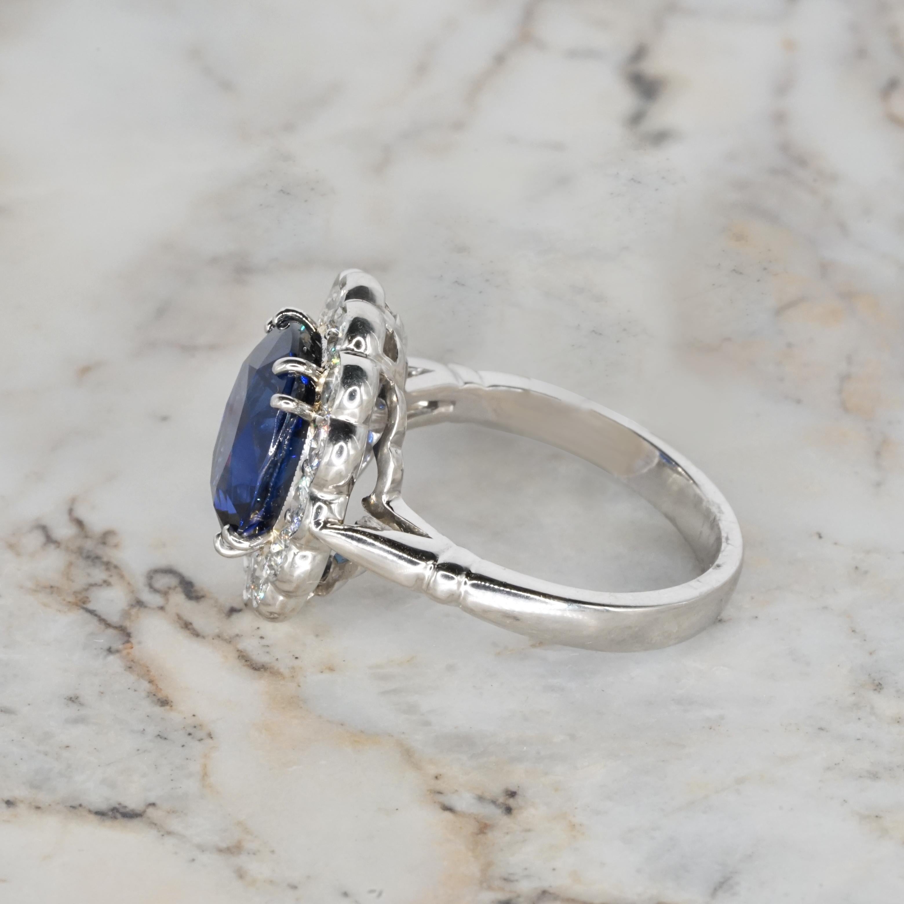 Oval Cut Certified 5 Carat Blue Oval Shape Sapphire Diamond Halo Platinum Cocktail Ring For Sale