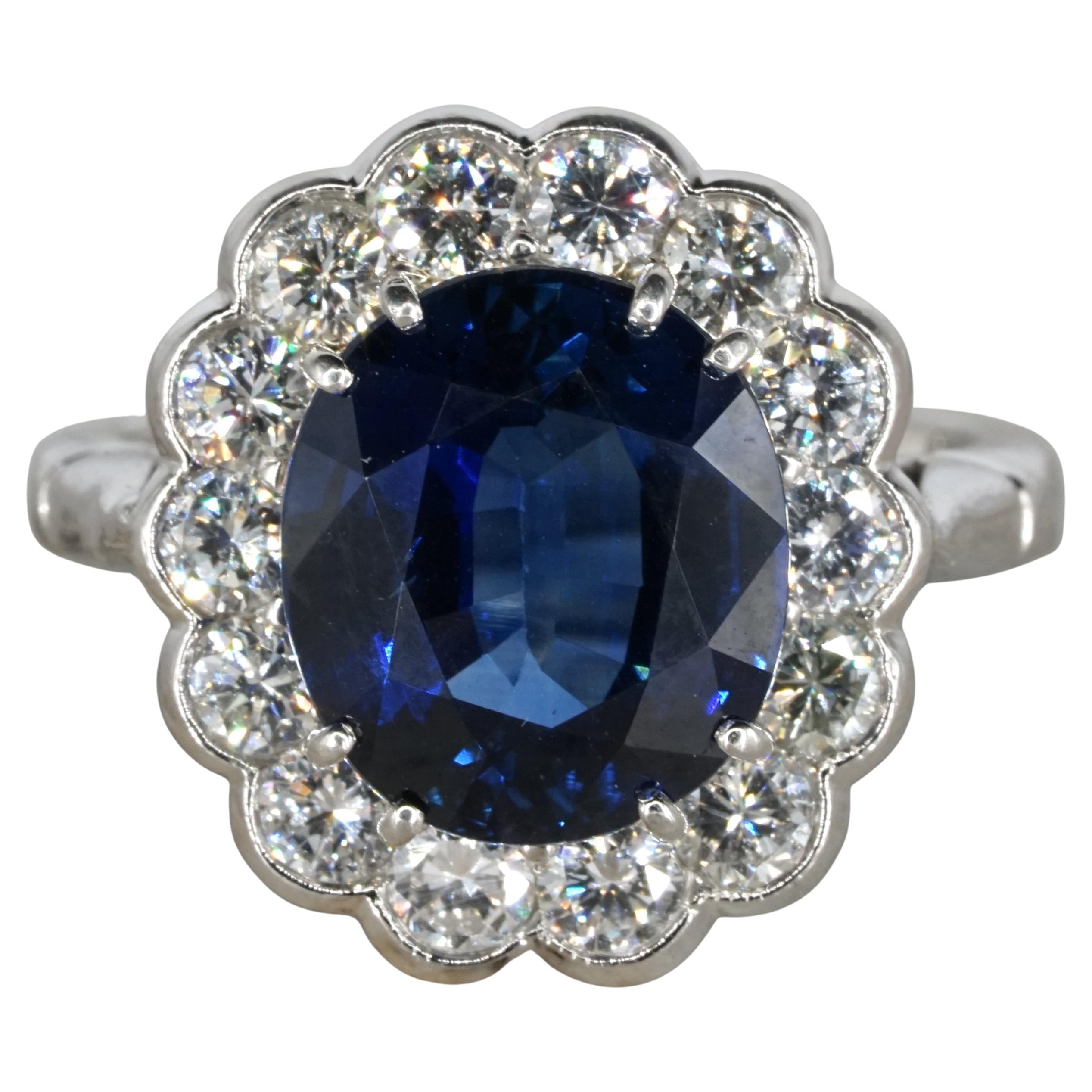 Certified 5 Carat Blue Oval Shape Sapphire Diamond Halo Platinum Cocktail Ring