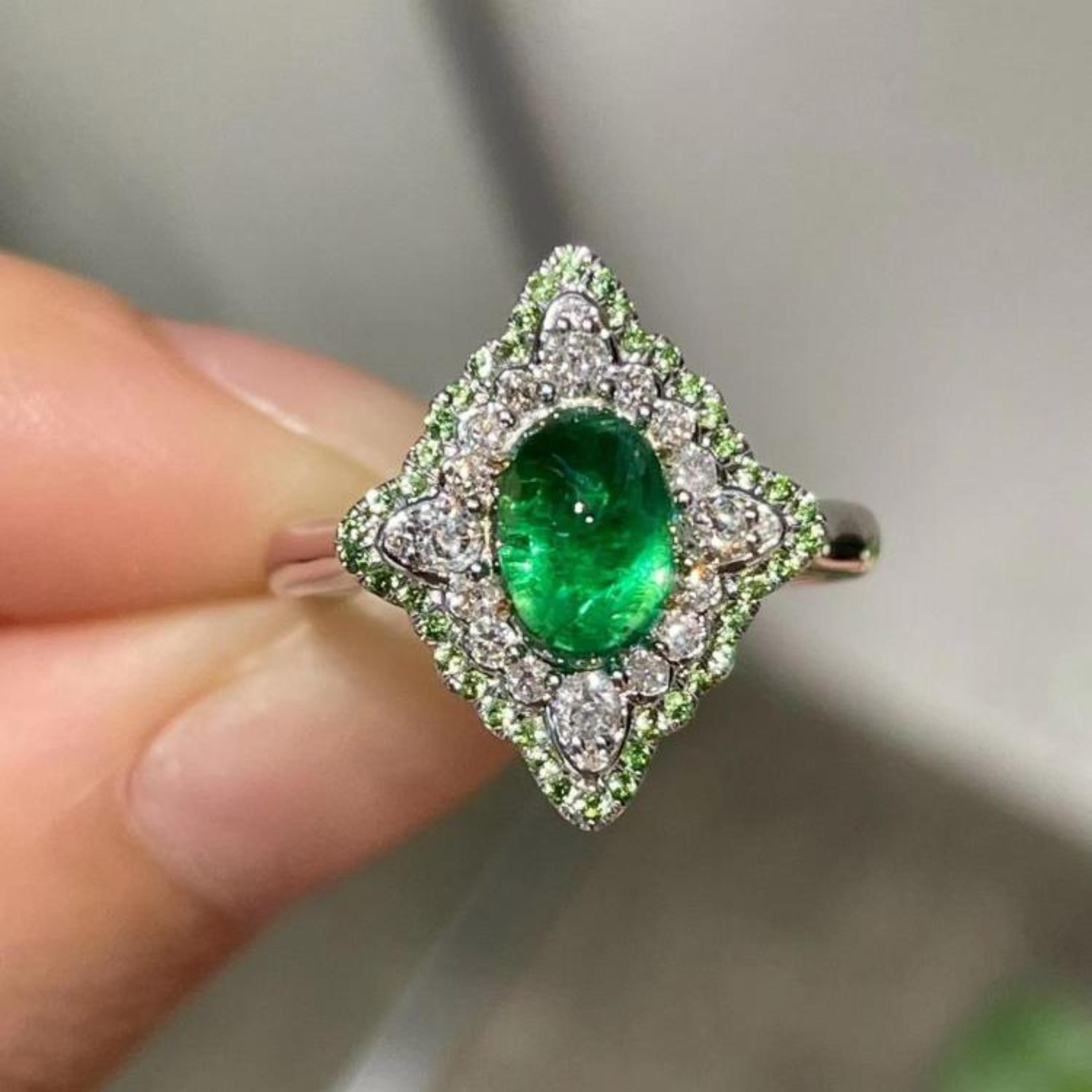 Certified 2 Carat Natural Emerald Diamond Engagement Ring, Unique Cocktail Ring

A stunning ring featuring IGI/GIA Certified 2.11 Carat Natural Emerald and 0.41 Carats of Diamond Accents set in 18K Solid Gold.

Emeralds are highly valued for their