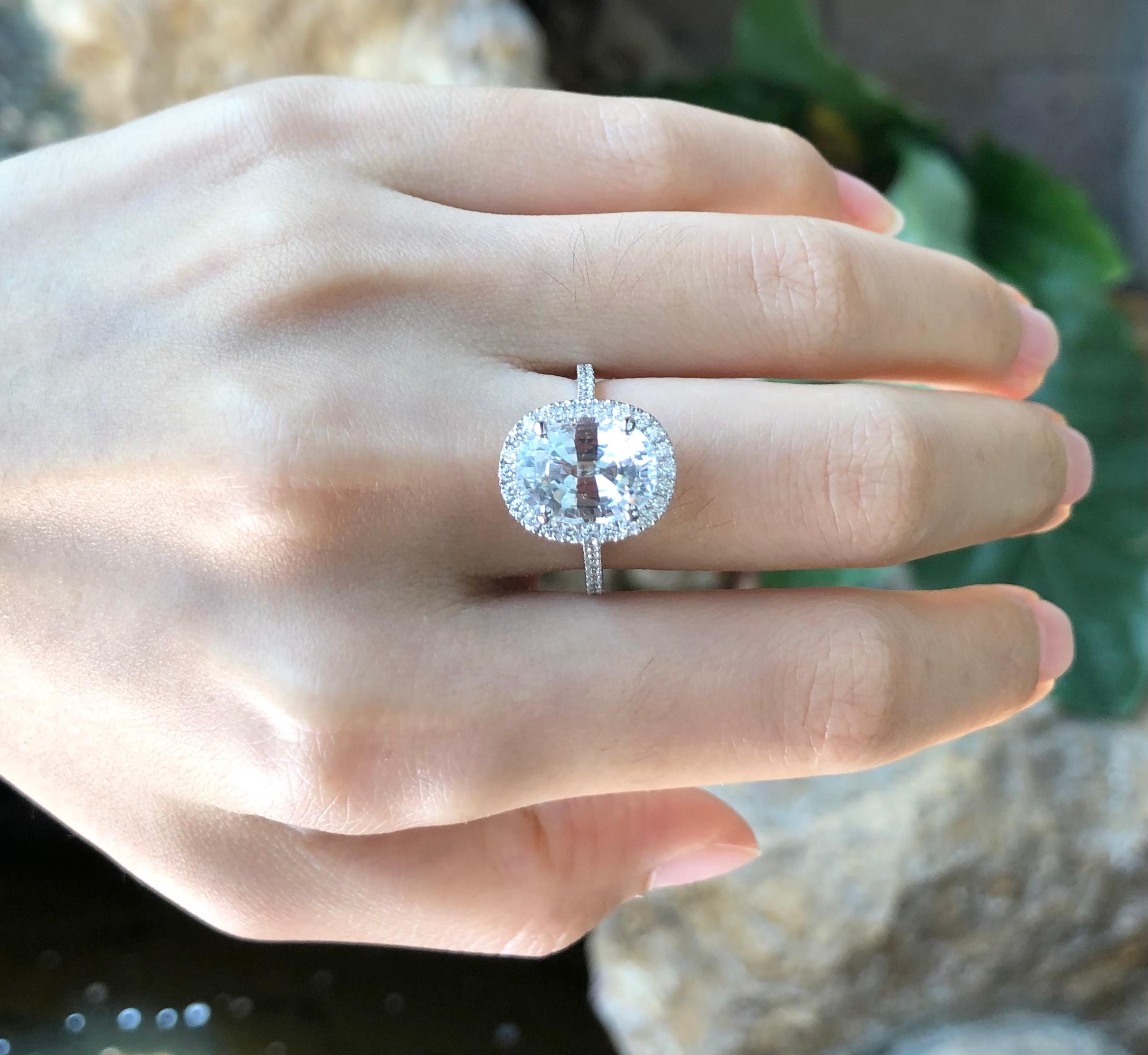 Certified White Sapphire 5.01 carats with Diamond 0.45 carat Ring set in 18 Karat White Gold Settings
(GIT Certified, The Gem and Jewelry Institute of Thailand)

Width:  1.2 cm 
Length:  1.5 cm
Ring Size: 53
Total Weight: 5.71 grams

White