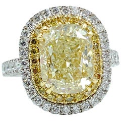 Certified 5.01 Carat Fancy Light Yellow Diamond Ring