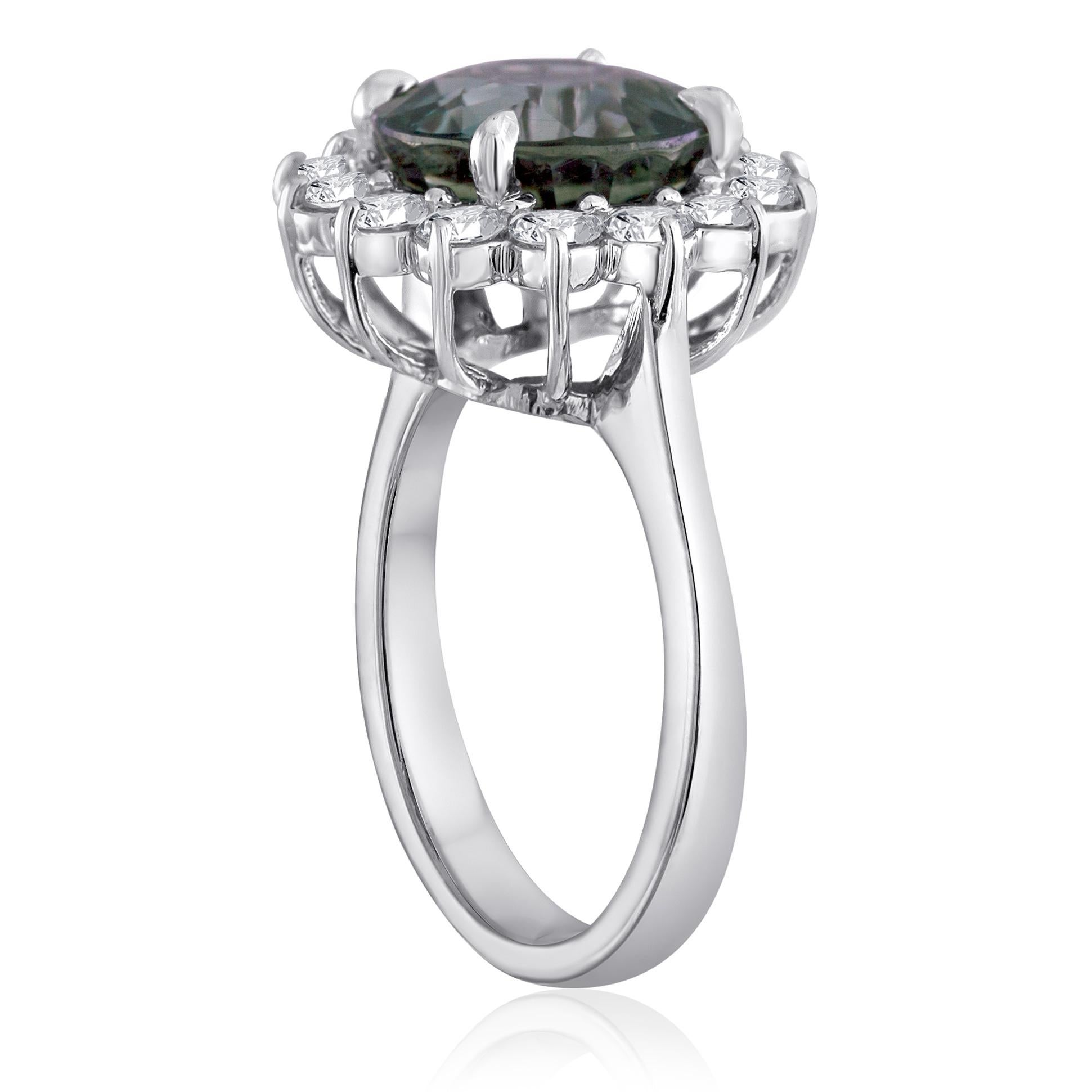 Exquisiter Ring mit graublauem Saphir
Der Ring ist 14K Weißgold
Es sind 0,88 Karat in Diamanten F VS
Der Saphir ist 5,03 Karat No Heat Graublau
Der Stein ist von LAPIS zertifiziert.
Der Ring ist eine Größe 6,25, sizable
Der Ring wiegt 6.0 Gramm