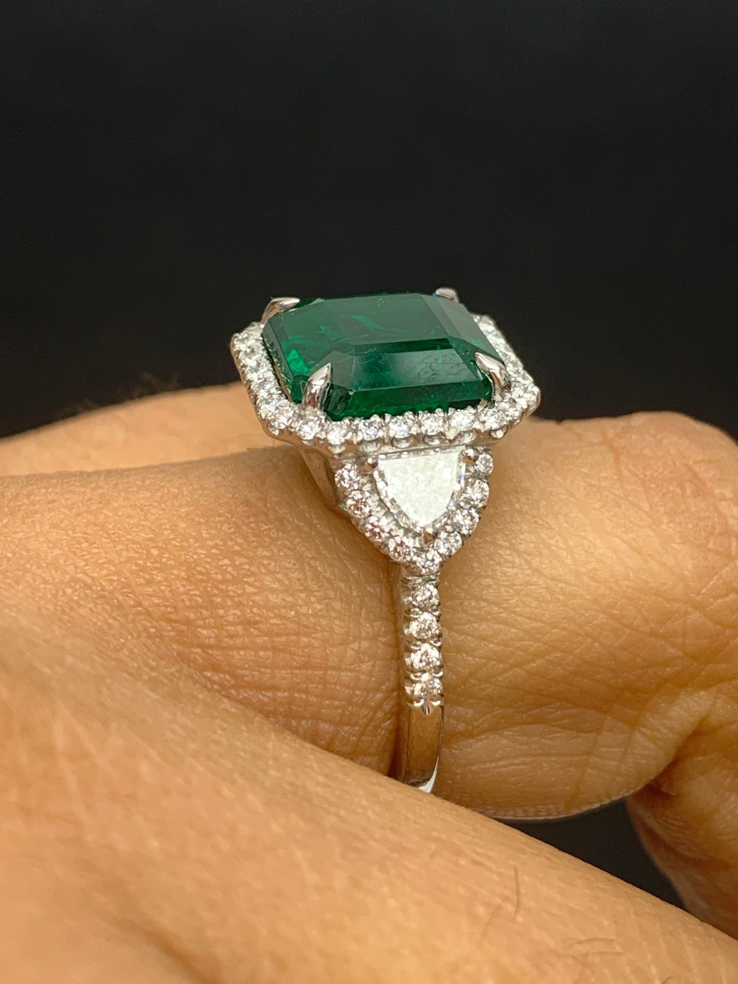 Certified 5.23 Carat Emerald Cut Emerald Diamond 3 Stone Halo Ring in Platinum For Sale 1
