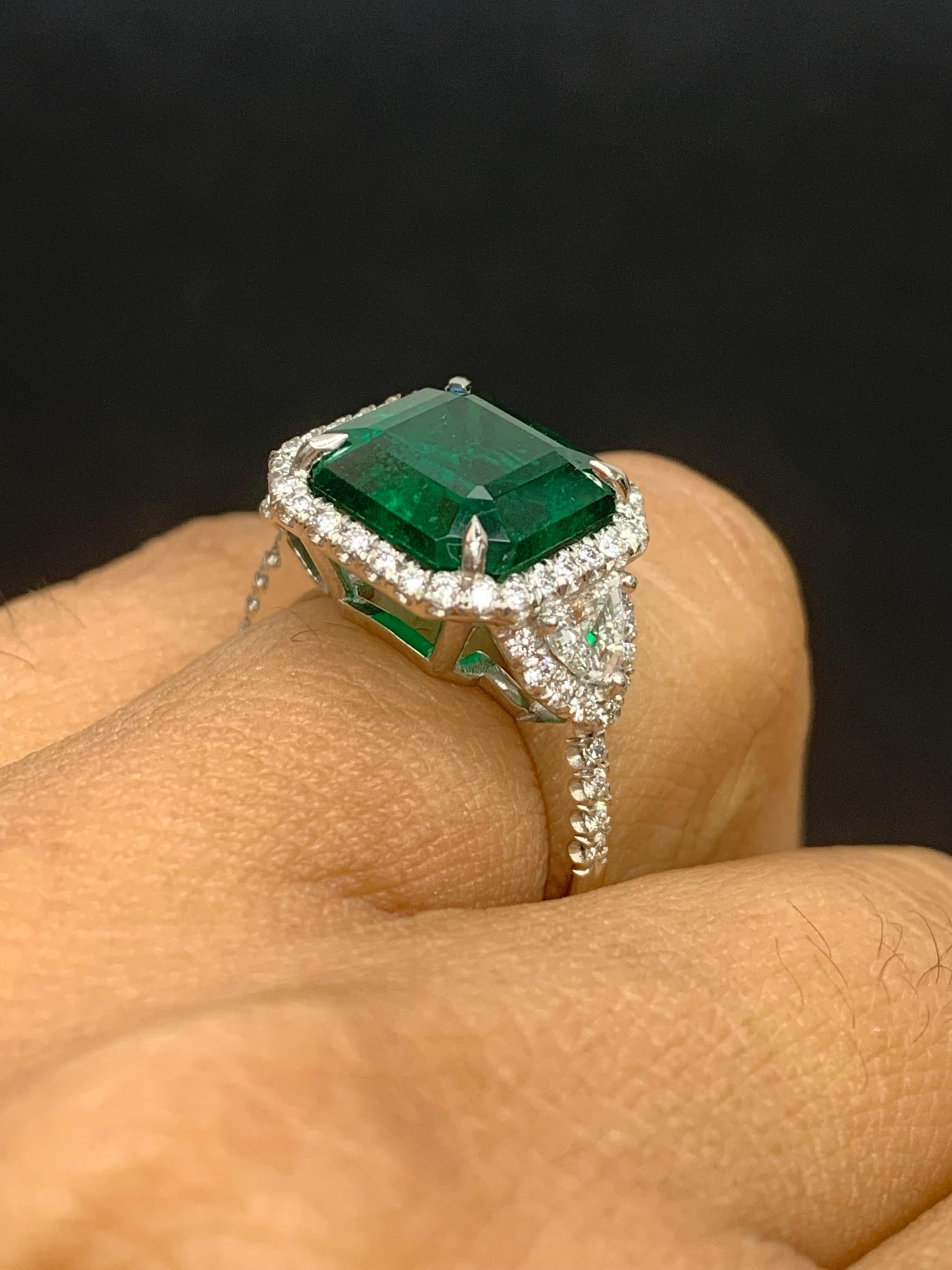 Certified 5.23 Carat Emerald Cut Emerald Diamond 3 Stone Halo Ring in Platinum For Sale 2