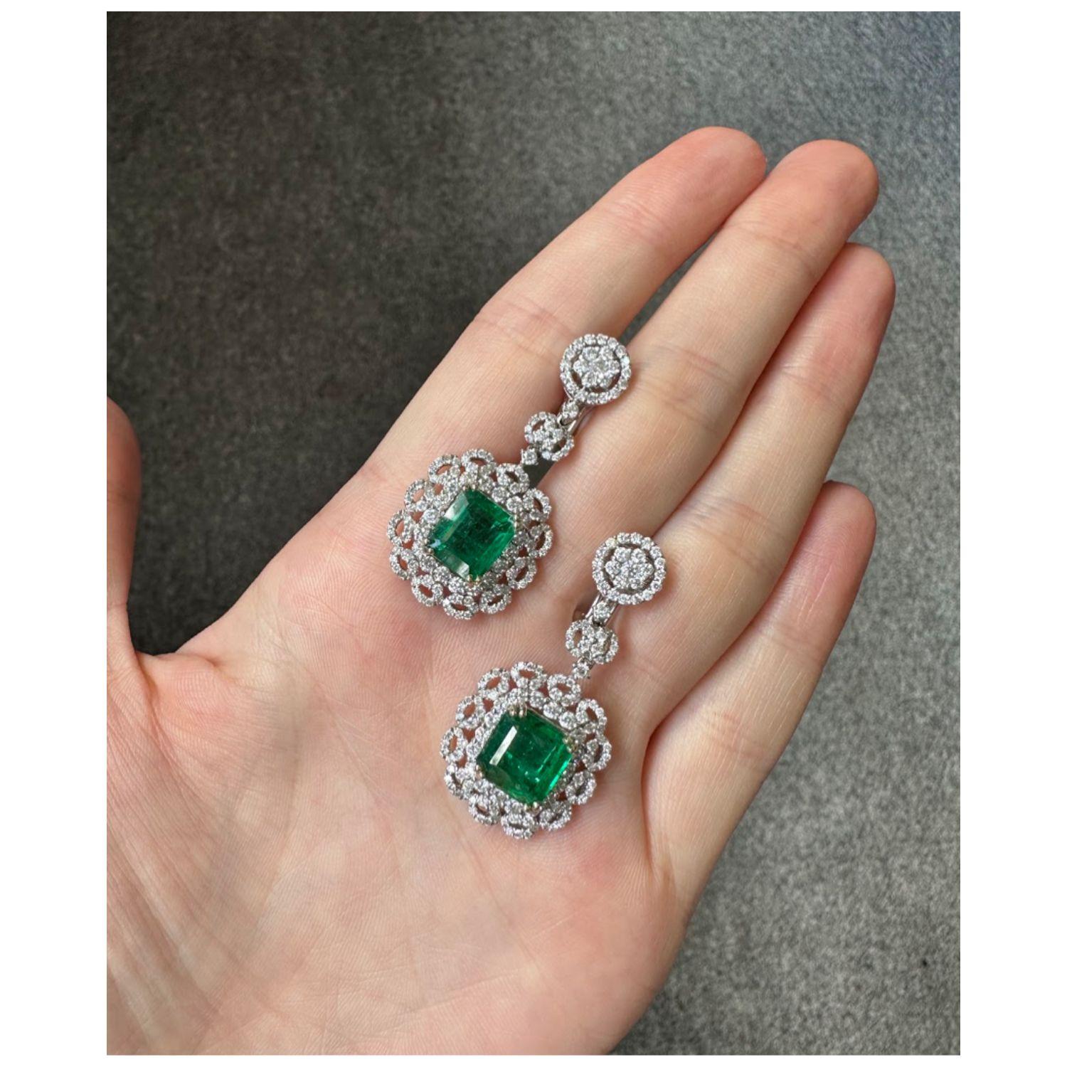 Modern Certified 5.3 Carat Emerald and Diamond Dangle Earrings For Sale