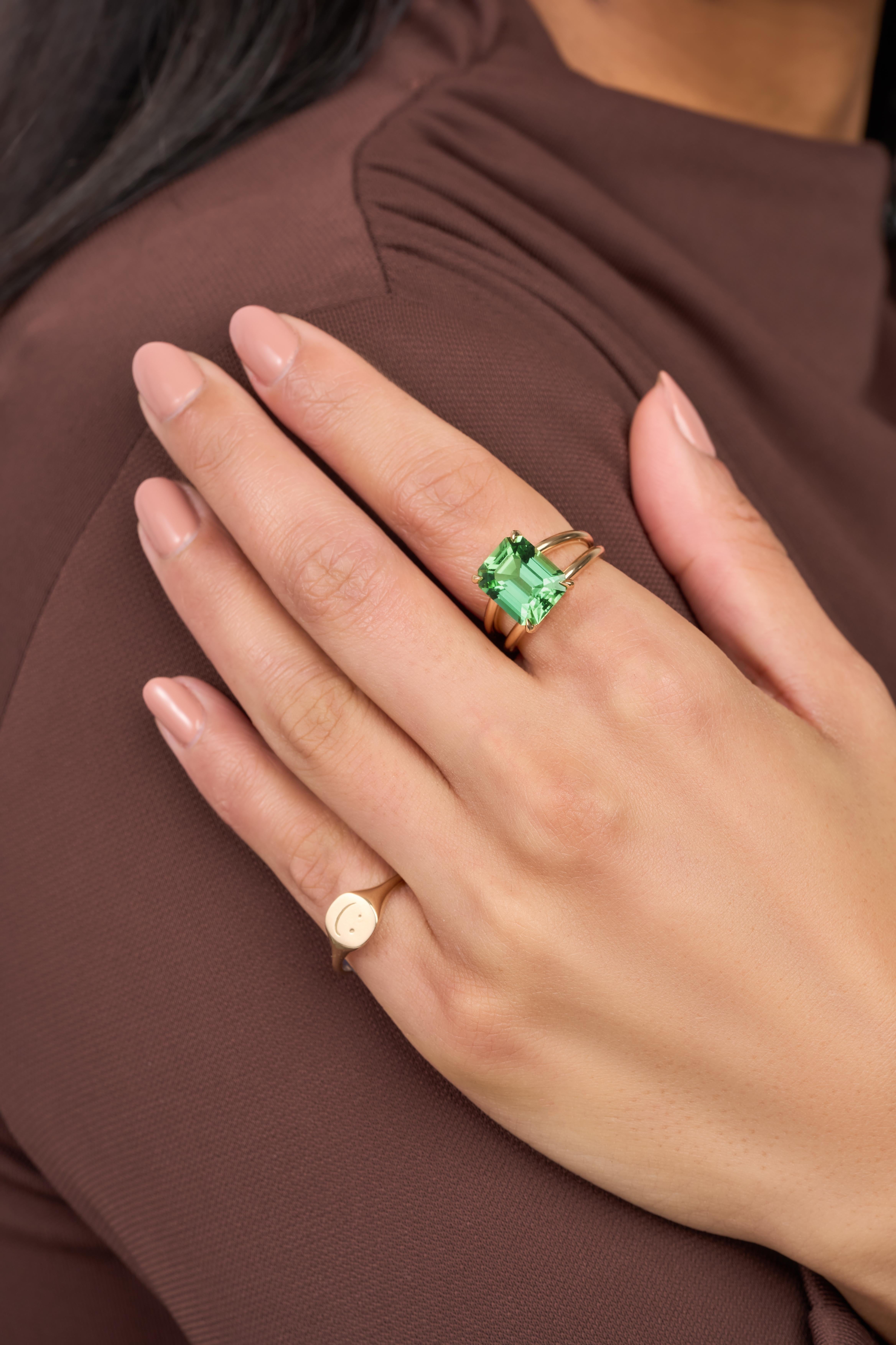 With a design that simply cannot go unnoticed, our Lagoon Tourmaline Cocktail Ring is where a 5-carat neon green tourmaline finds its soulmate in in solid yellow gold. Part of our signature cocktail collection, this ring hugs the finger it adorns