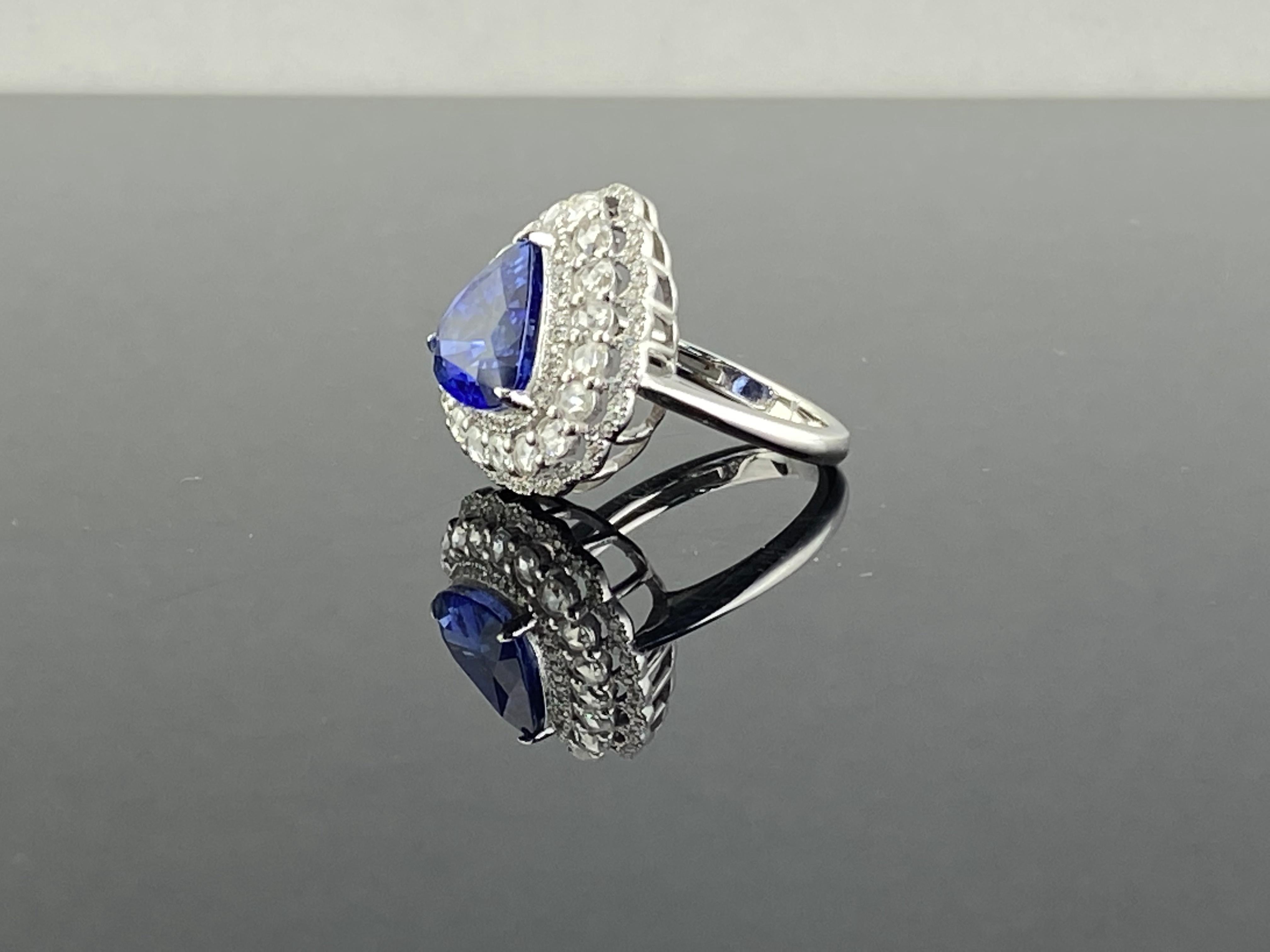 Art Deco Certified 5.30 Carat Pear Shape Blue Sapphire and Diamond Engagement Ring