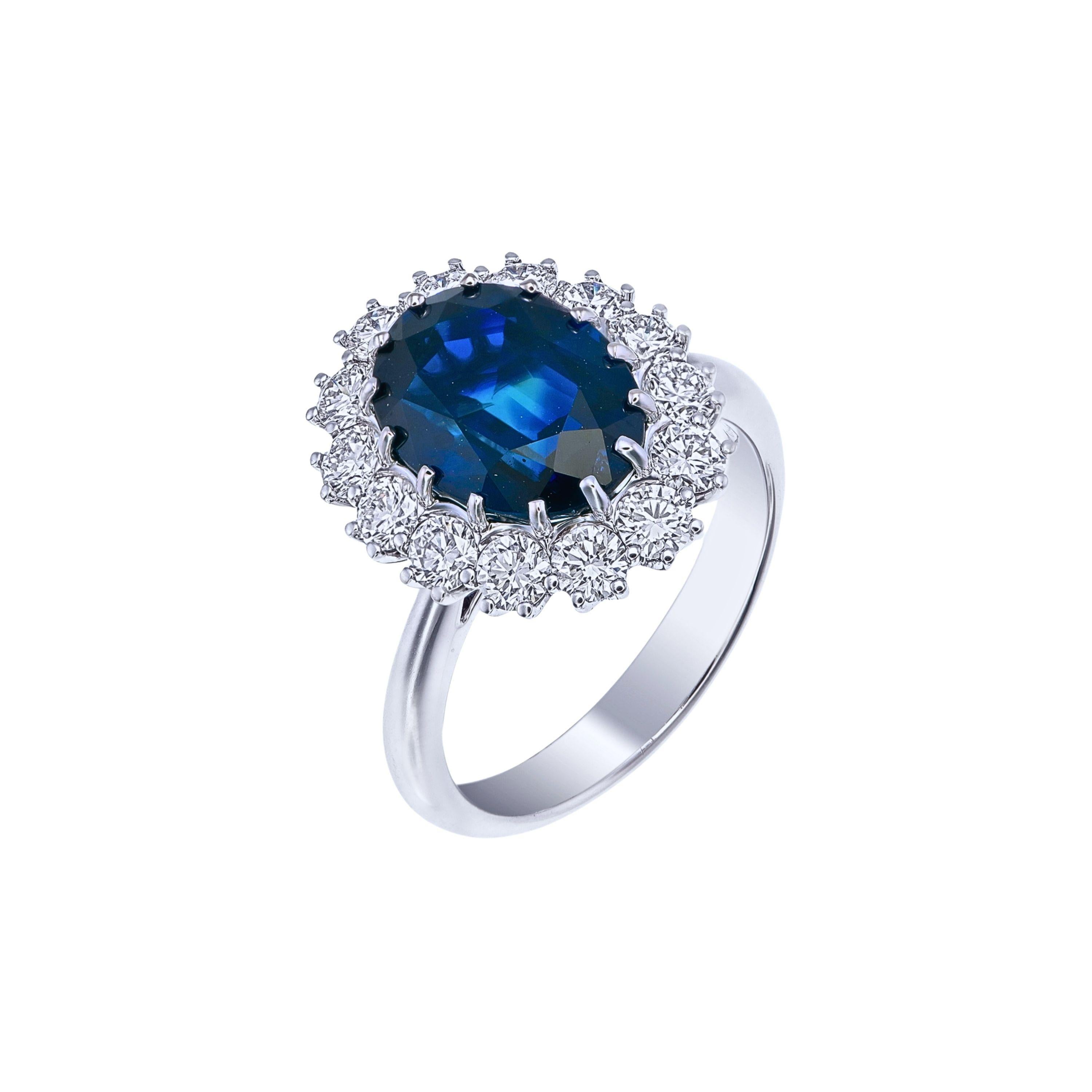 Introducing this certified 5.40 Carat Siam Sapphire and Diamond Ring, a one-of-a-kind creation that combines understated elegance with exceptional quality. At its center is a 5.40-carat oval sapphire, sourced from Siam (Thailand). Certified for its