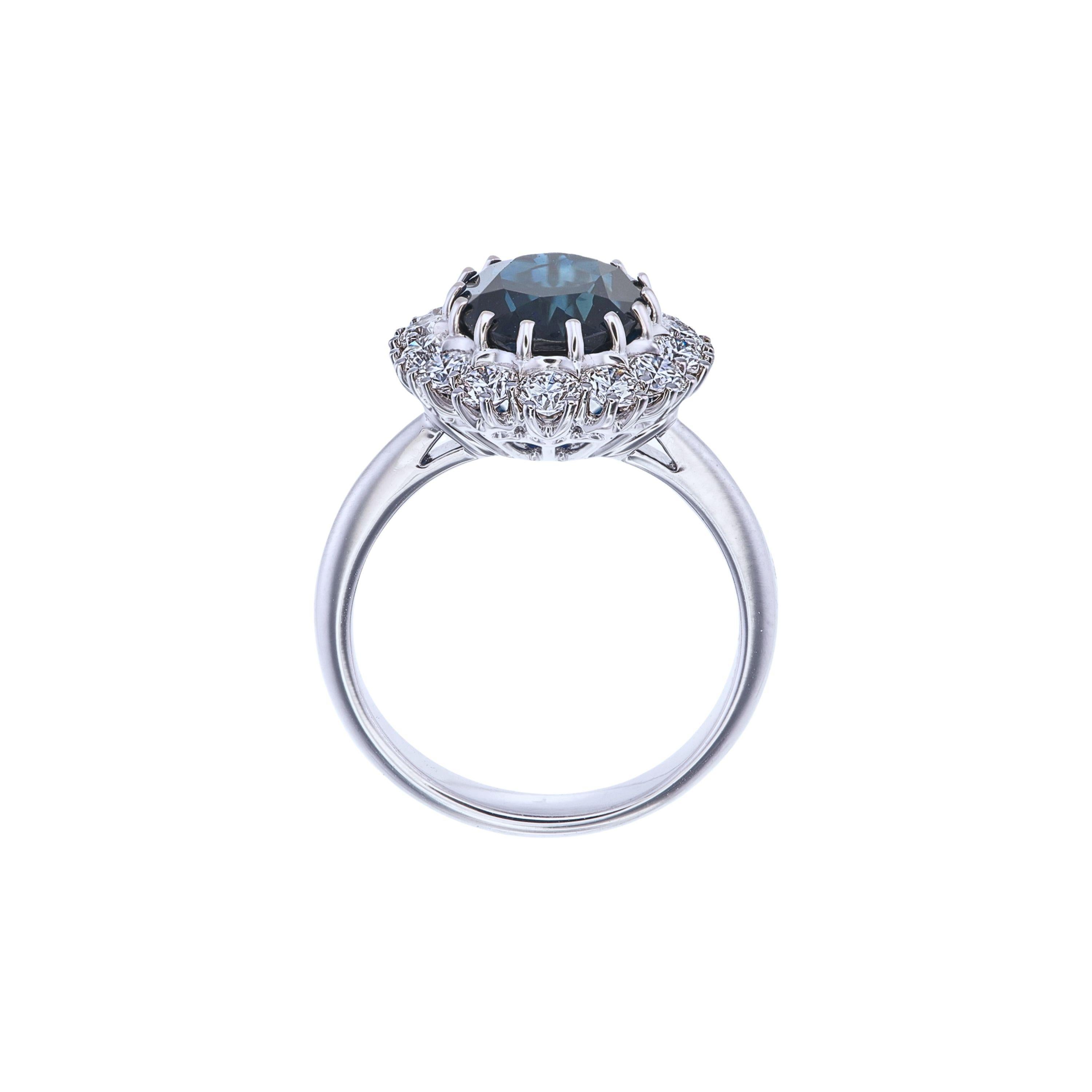 Contemporary Certified 5.40 Carat Natural Intense Blue Sapphire & Diamond Halo Ring For Sale