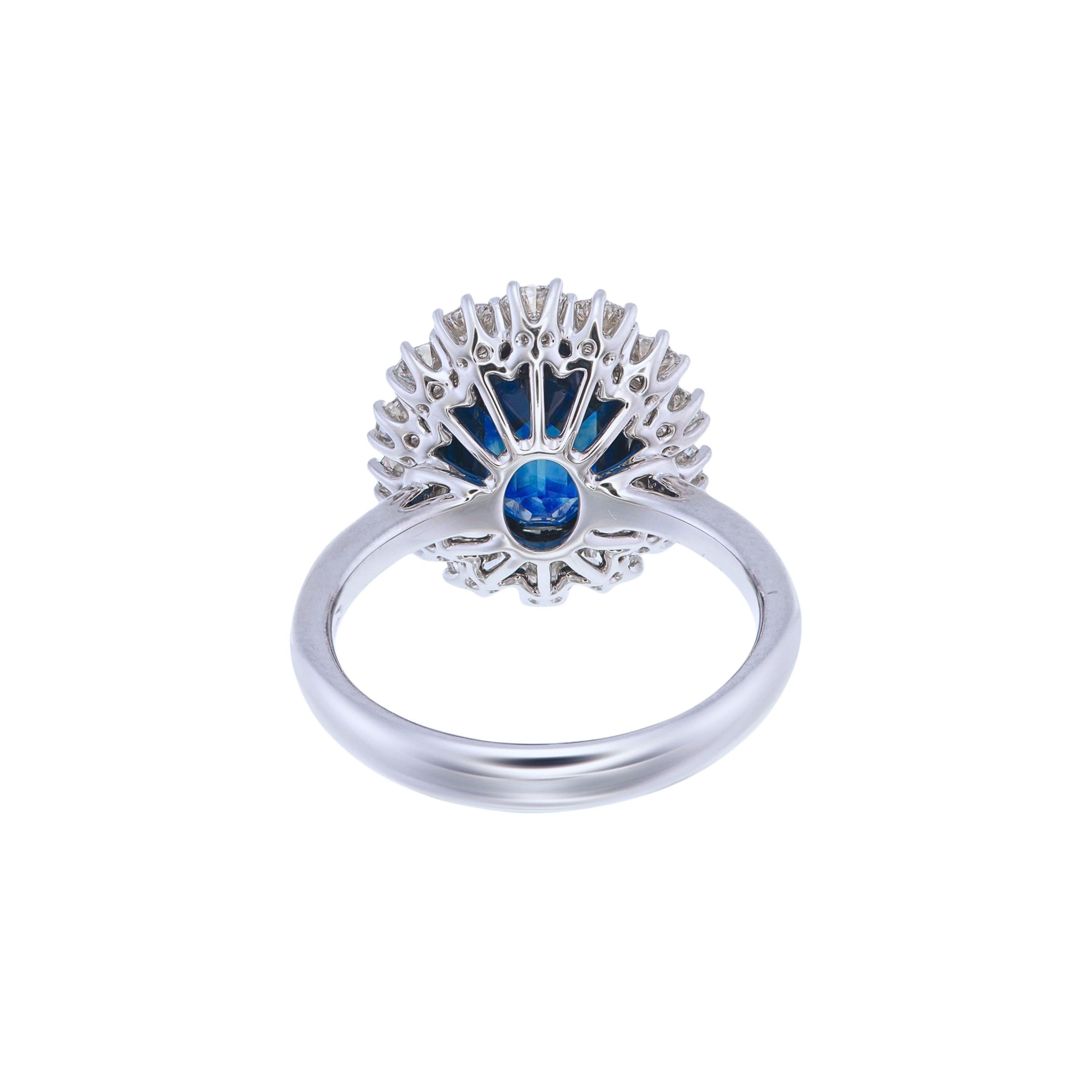 Oval Cut Certified 5.40 Carat Natural Intense Blue Sapphire & Diamond Halo Ring For Sale