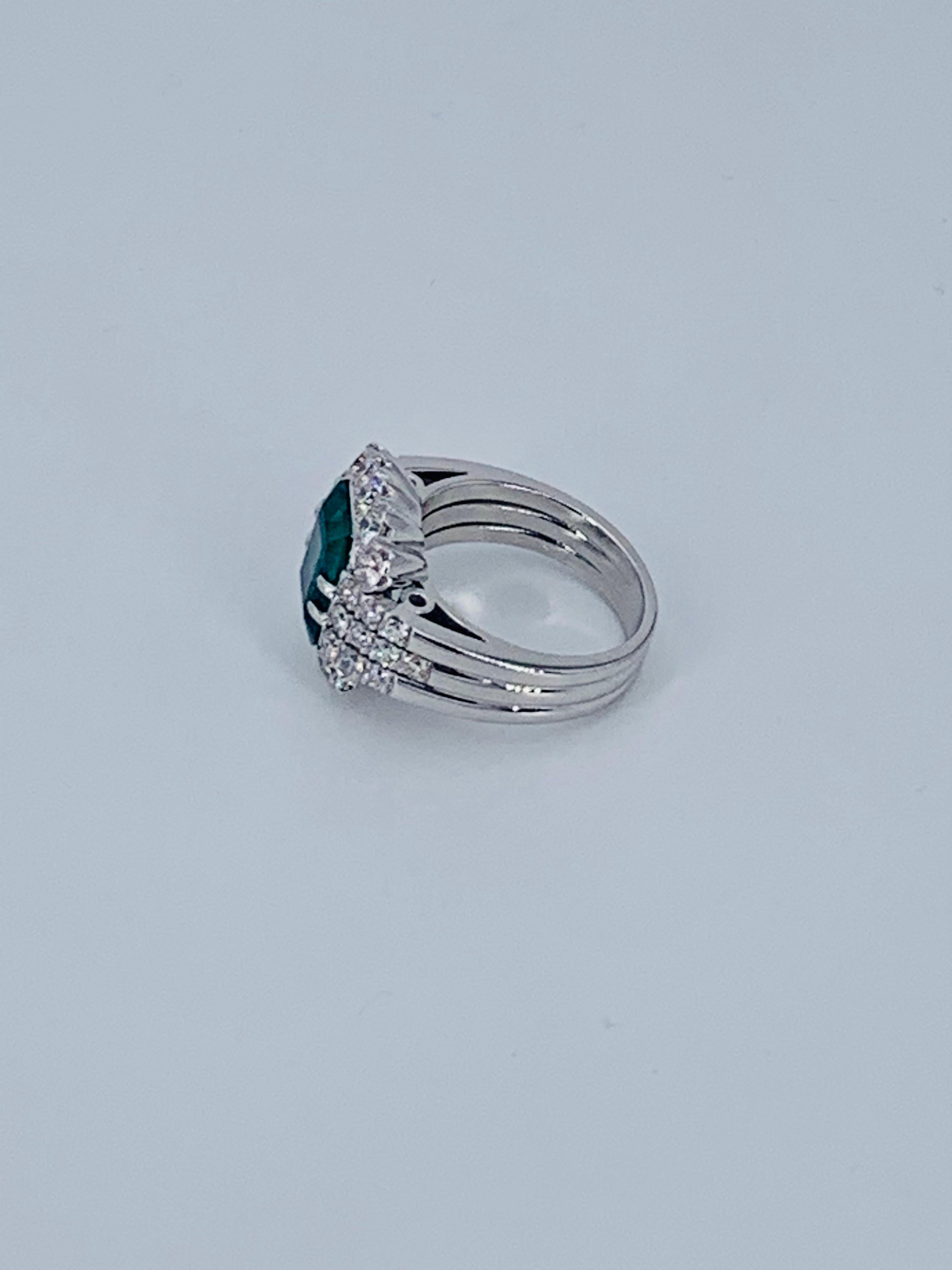 Contemporary 5.66 Carat Colombian Emerald Floral Designed Diamond Cocktail Ring For Sale