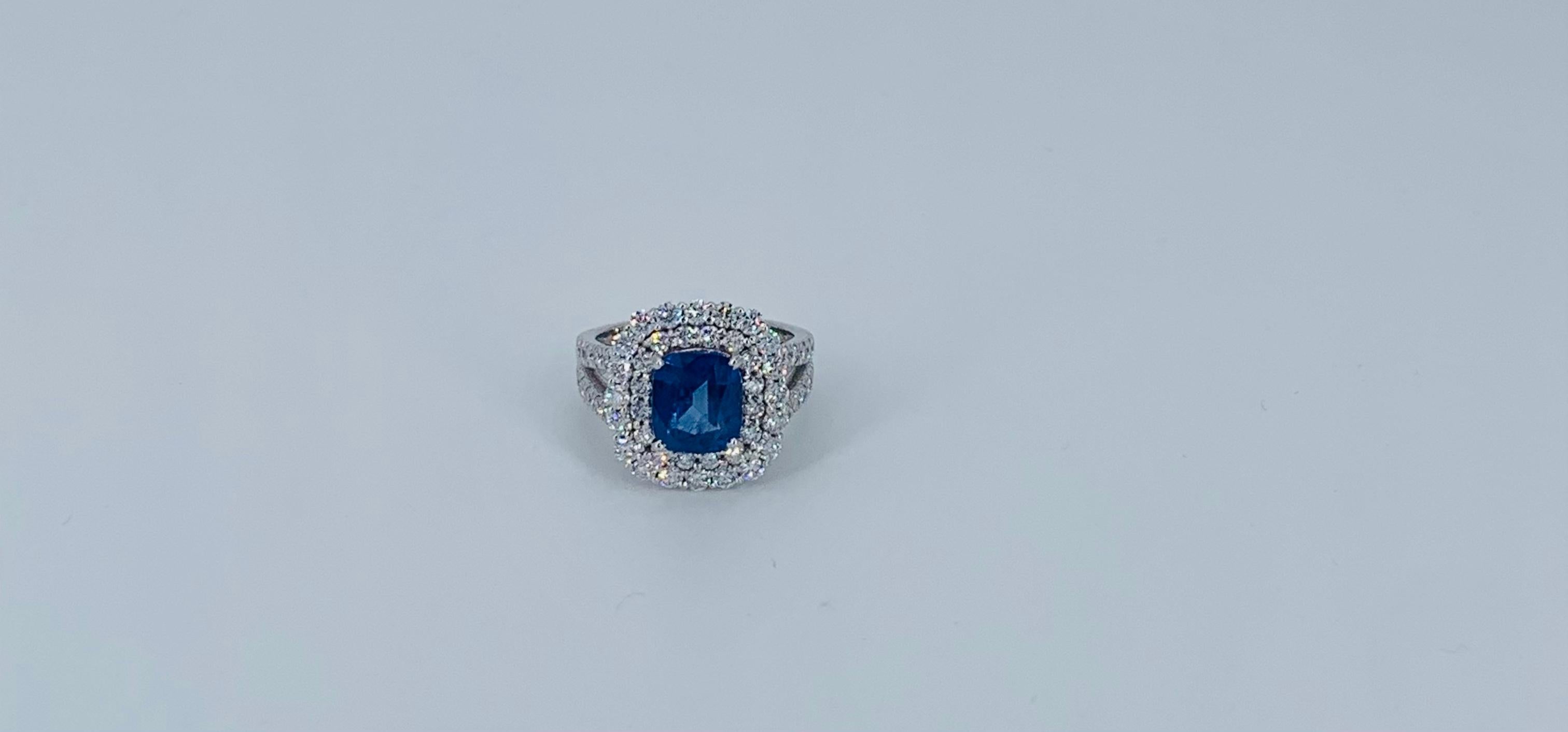 Round Cut Contemporary 4.93 Carat Sapphire Double Diamond Halo Cocktail Ring For Sale