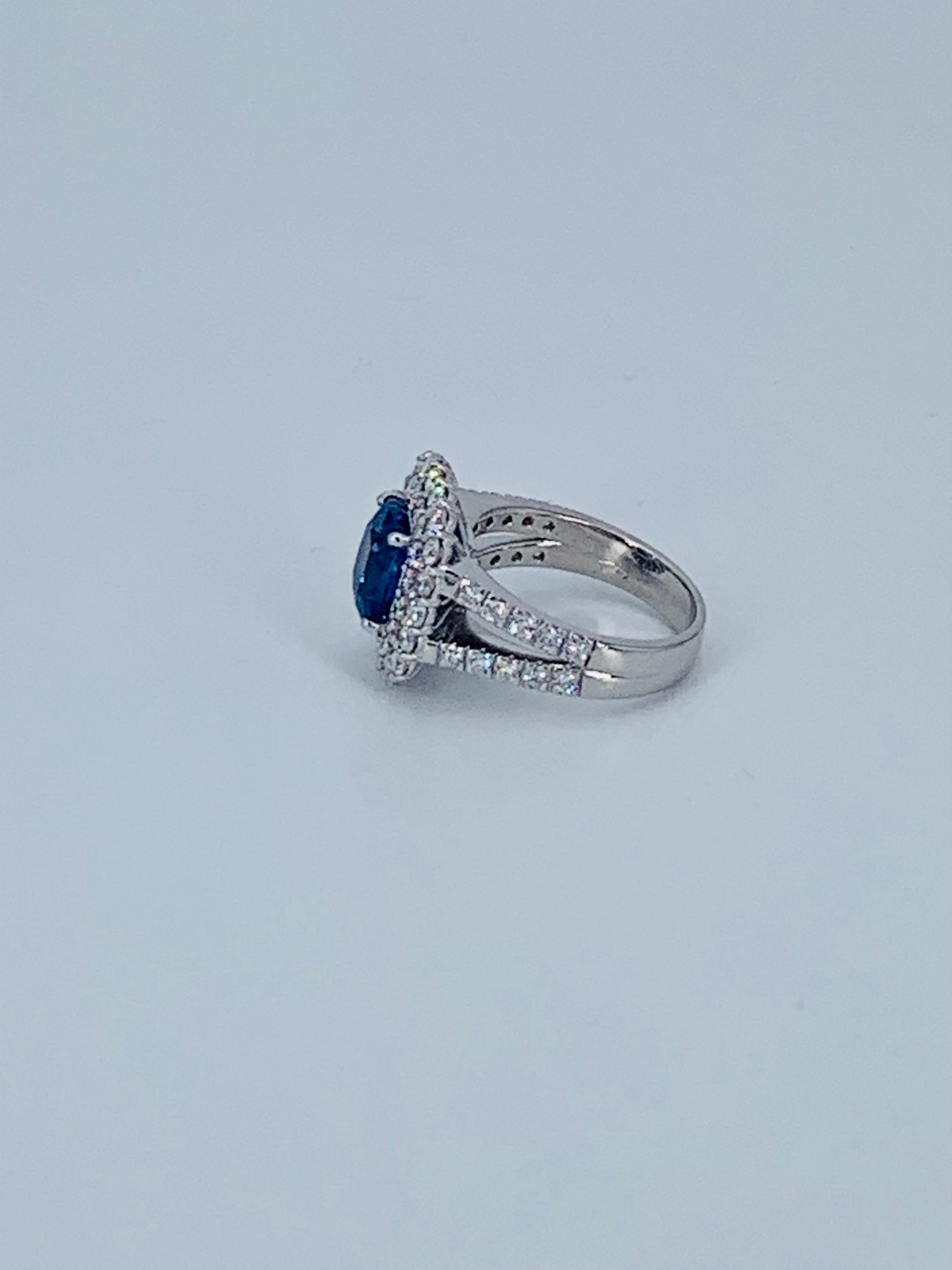 Women's or Men's Contemporary 4.93 Carat Sapphire Double Diamond Halo Cocktail Ring For Sale