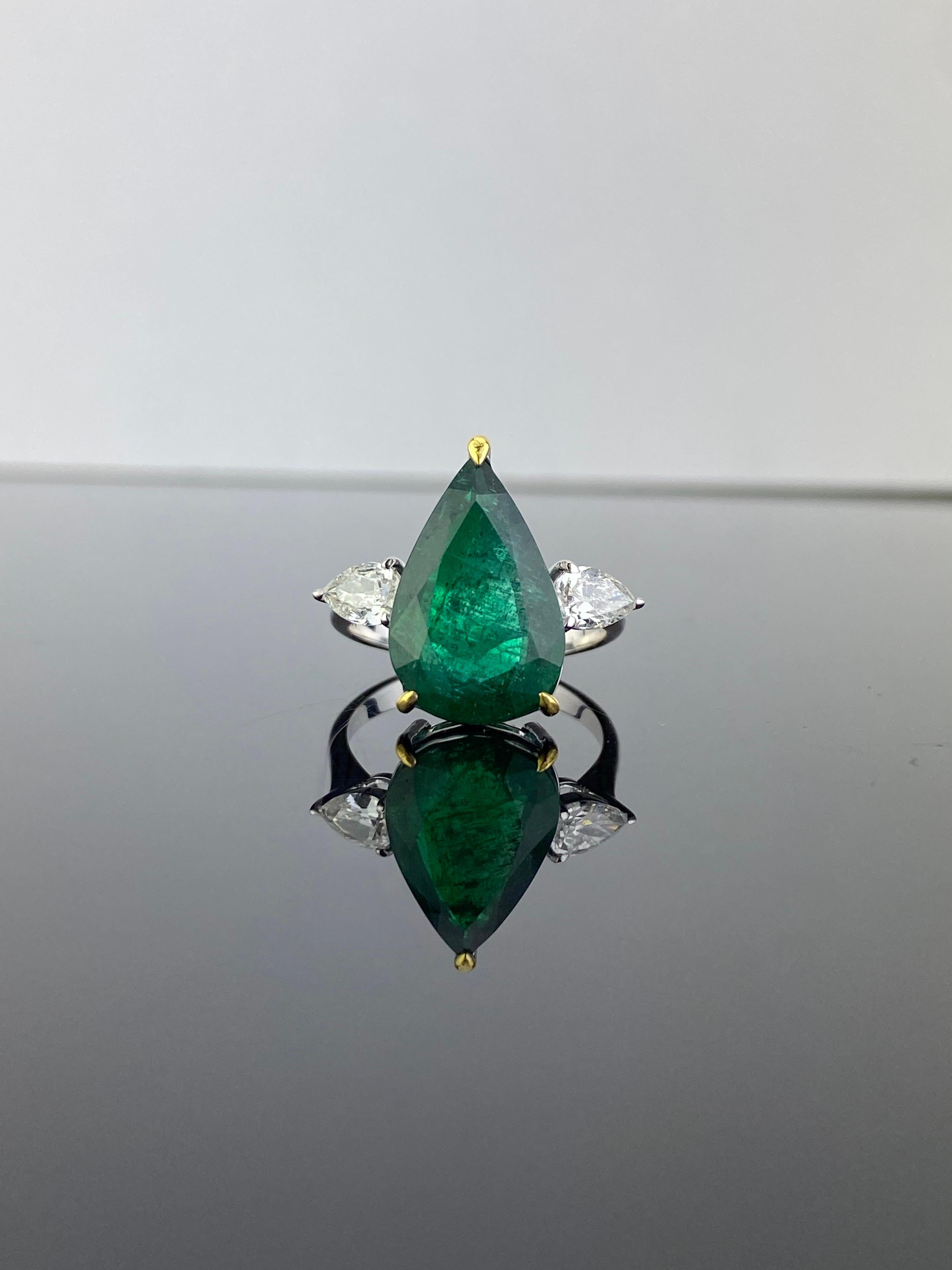 Pear Cut 5.70 Carat Emerald and Diamond Three Stone Engagement Ring For Sale