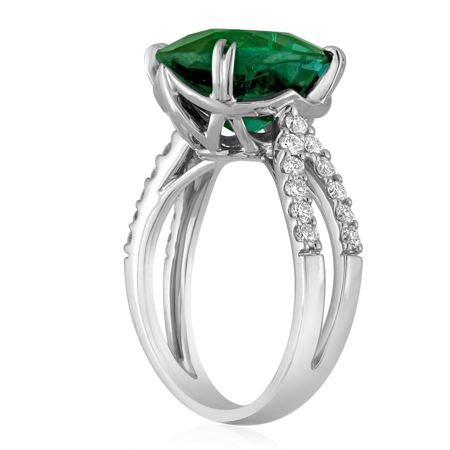 One-Of-A-Kind Tourmaline Ring
The ring is 18K White Gold
The ring has 0.45 Carats in Diamonds F VS/SI.
The center stone is an oval Greenish Blue Tourmaline.
The tourmaline is 5.97 Carats Certified by LAPIS.
The ring is a size 6.5, sizable.
The ring