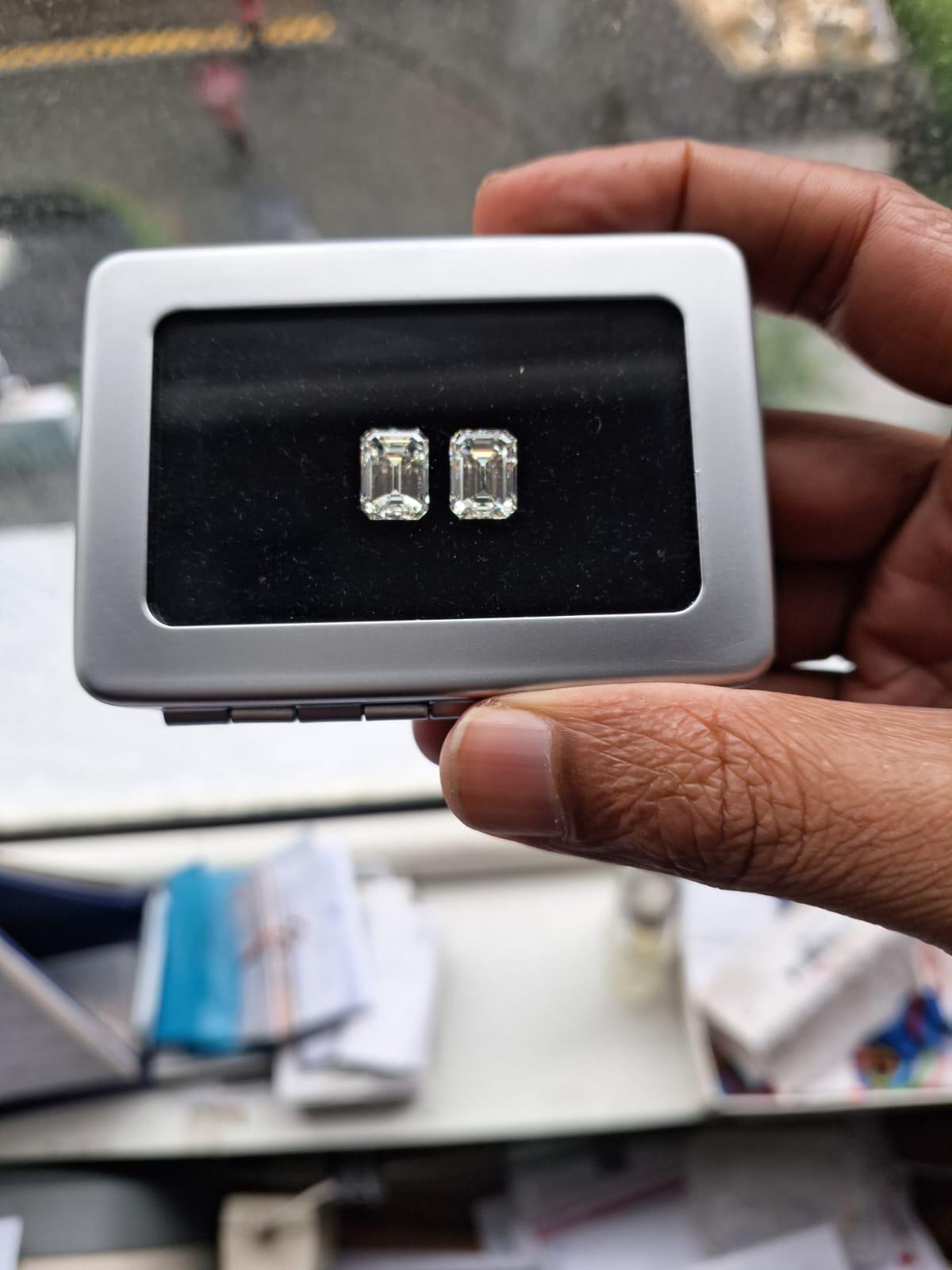 A beautiful pair of certified 3.02 and 3.01 carat each J color, VVS1 clarity and IF clarity Emerald cut Diamonds. Can be customized to make a statement pair of earrings. 