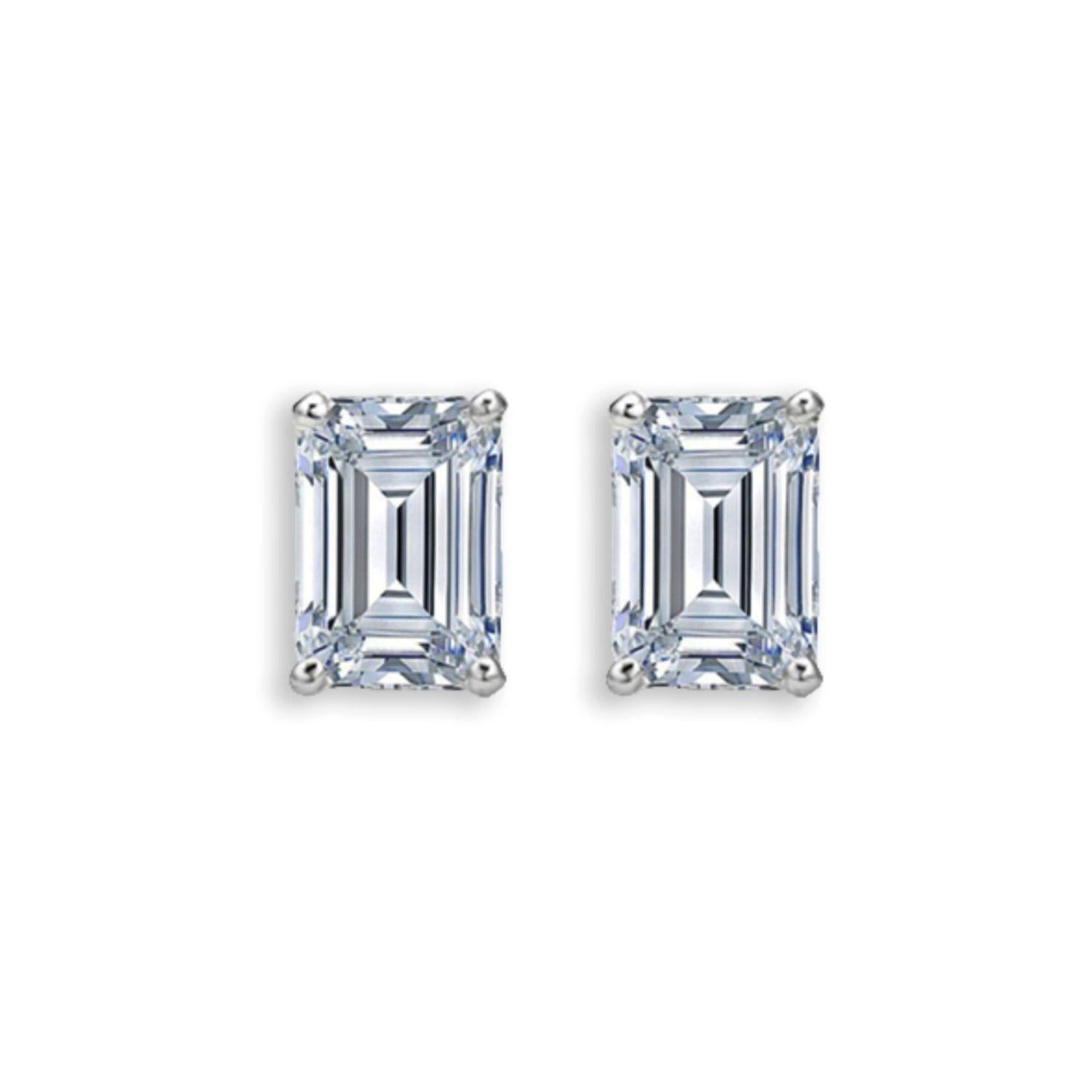 Modern Certified 6.03 Carat J Color VVS1/IF Clarity Emerald Cut Diamond Studs