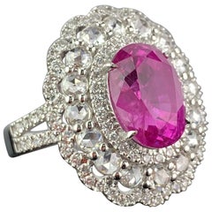 Bague cocktail en rubis et diamants de forme ovale certifiés 6,24 carats