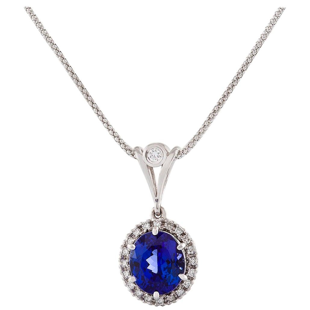 Certified 6.30 Carat Oval Tanzanite and Diamond Necklace in 18 Carat White Gold For Sale