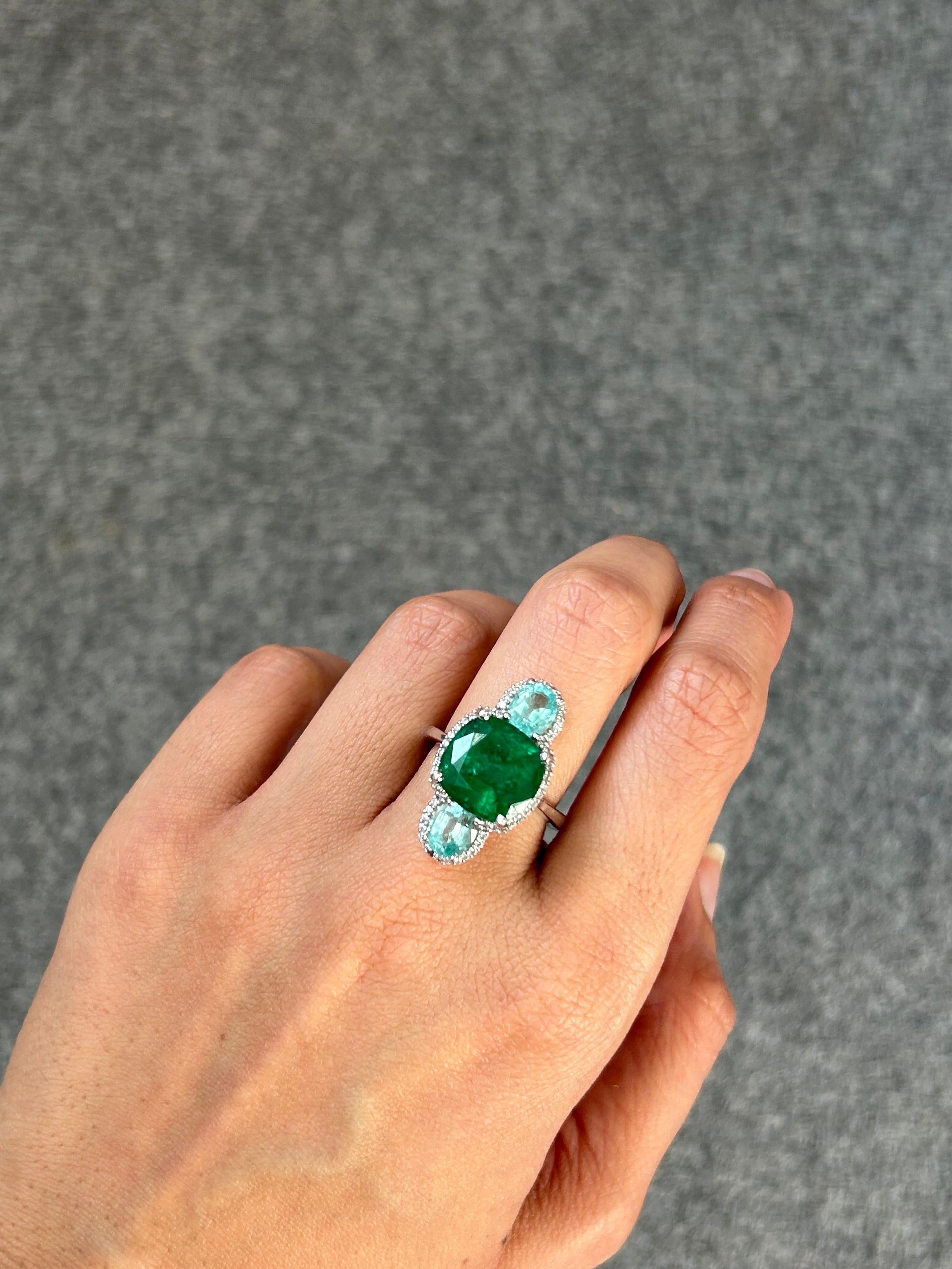 Modern Certified 6.47 Carat Emerald, 1.96 Carat Paraiba and Diamond Three-Stone Ring For Sale