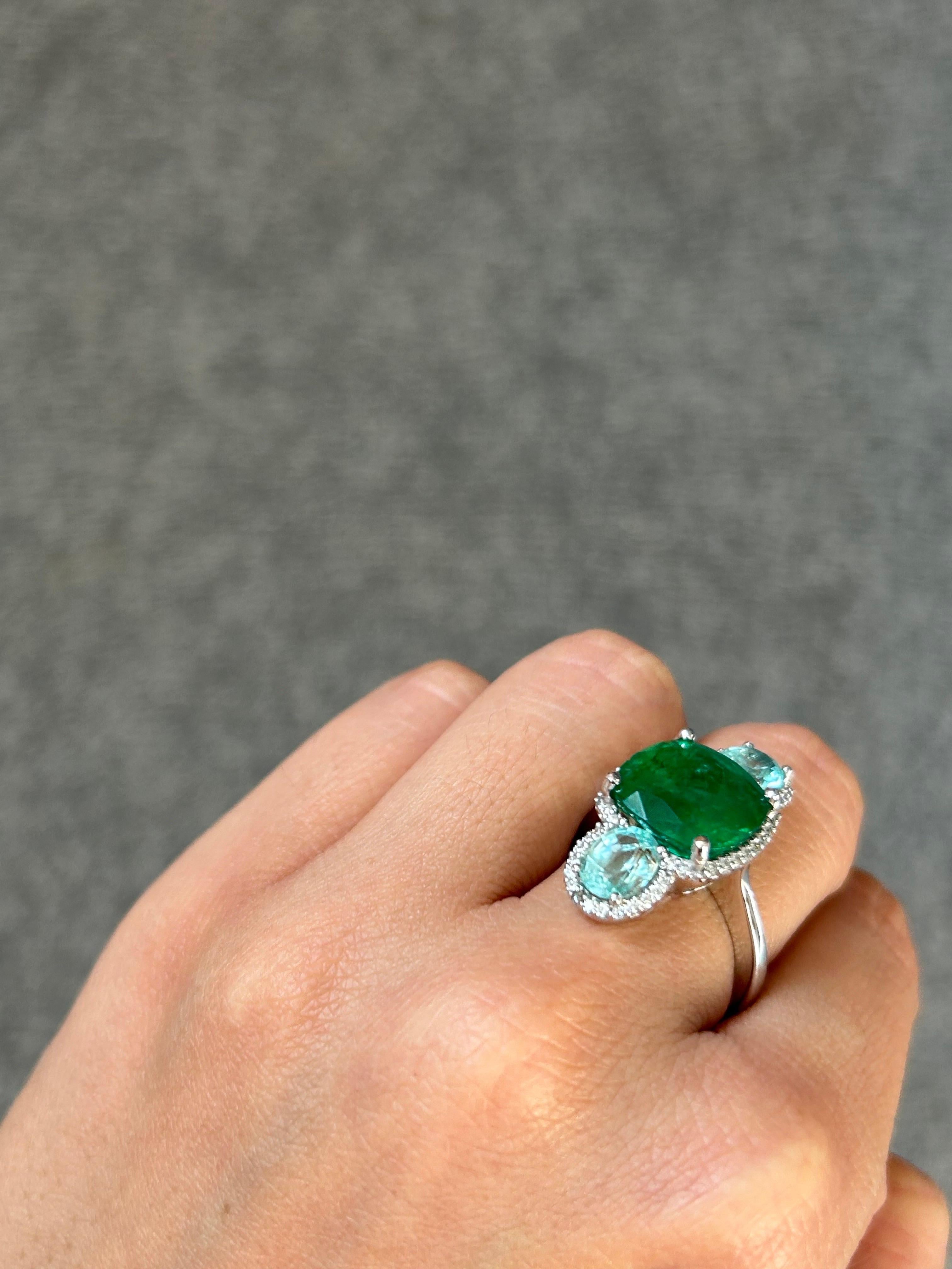 Cushion Cut Certified 6.47 Carat Emerald, 1.96 Carat Paraiba and Diamond Three-Stone Ring For Sale