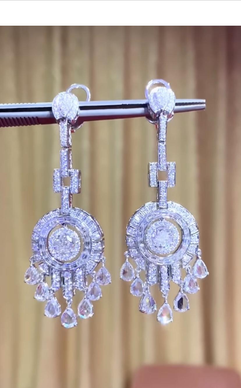 An exclusive pair of earrings in magnificent Art Deco design, so sophisticated, refined style, a very piece of art , by Italian designer.
Earrings come in 18K gold with 226 pieces of  Natural Diamonds, in perfect rosè , round brilliant, baguettes