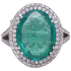 Certified 6.66 Carat Zambian Emerald Oval Halo Ring with Diamonds in 18K Gold