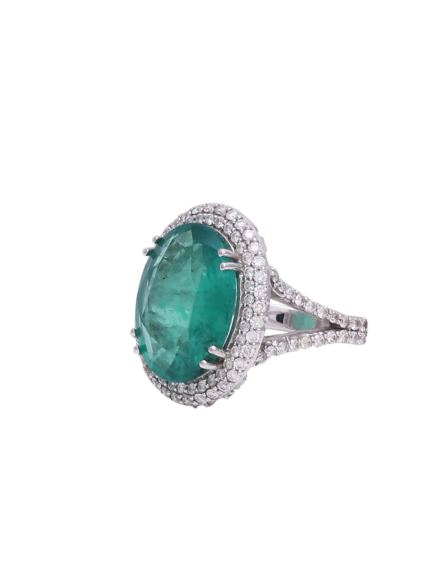A classic ring with an Oval cut Zambian Emerald weighing 6.66cts surrounded with fine quality white diamonds set in 18K White gold. The Emerald is certified from a credible Indian Laboratory.
Emerald is the Birthstone the month of May and is