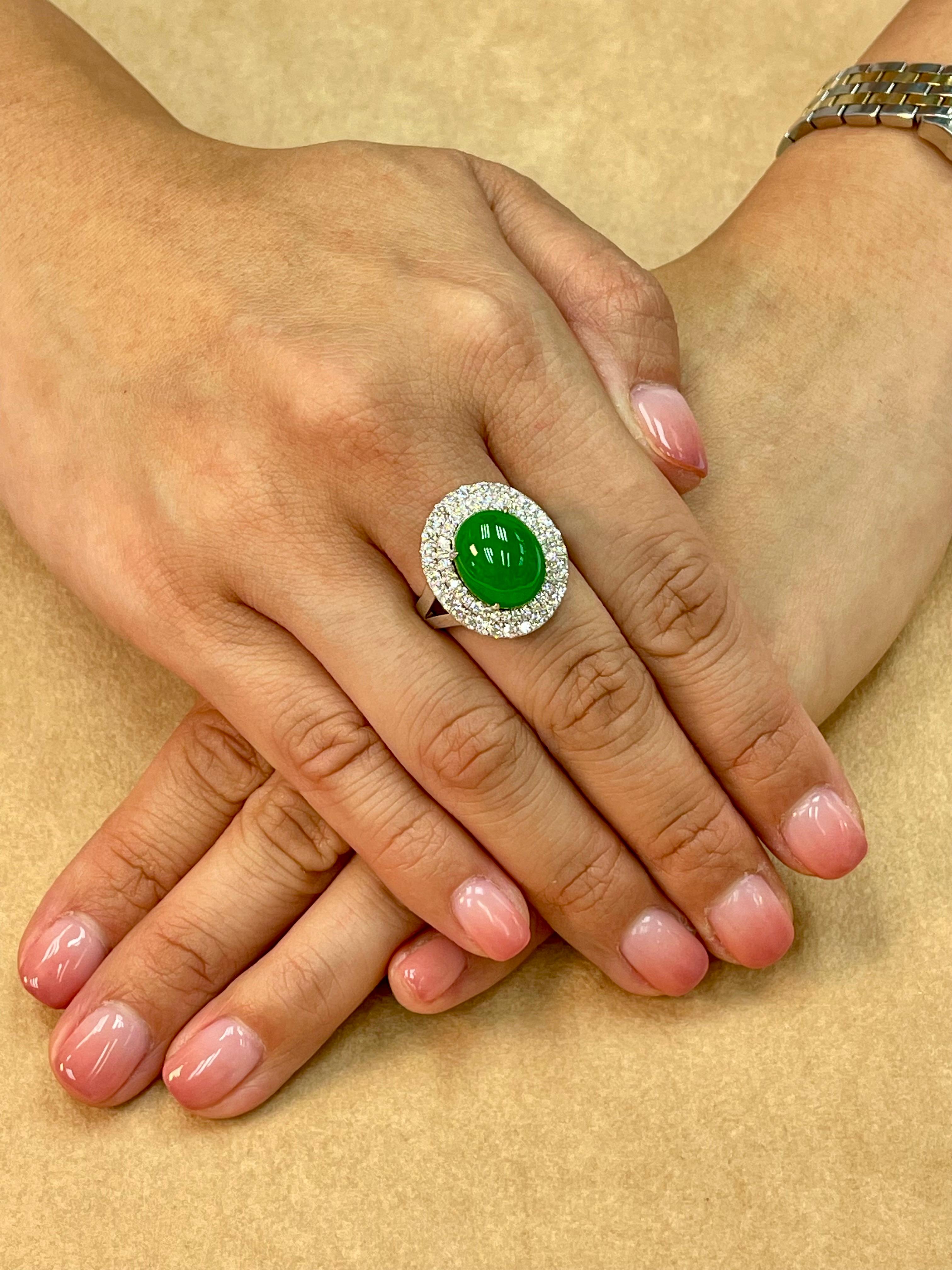 Please check out the HD video. THIS JADE IS SUBSTANTIAL! Here is a bright apple green XL oval high domed cabochon jade (13.3mm) and diamond ring. This jade is one step away from being a true imperial jade! It is certified as natural jadeite jade