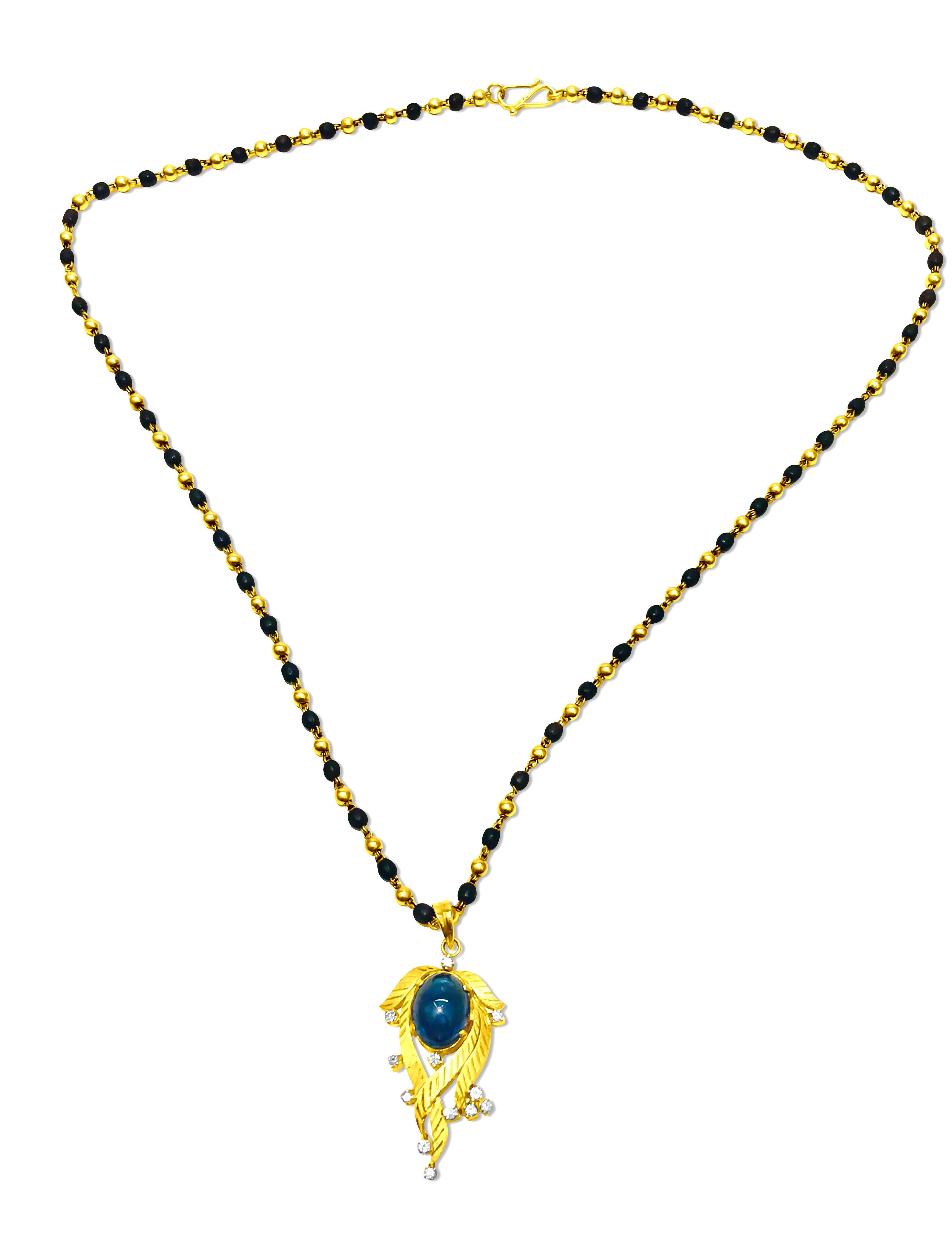 Design and Tradition: Embracing an Indian style, this necklace follows the Mangal sutra design, a traditional piece of Indian jewelry symbolizing love and marriage. The Mangal sutra, derived from Sanskrit words meaning 'holy' and 'auspicious