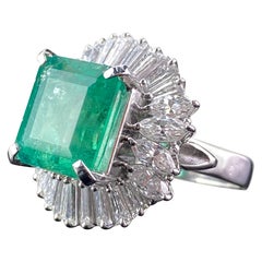 Certified 6.85 Carat Colombian Emerald, Diamond and Platinum Ring