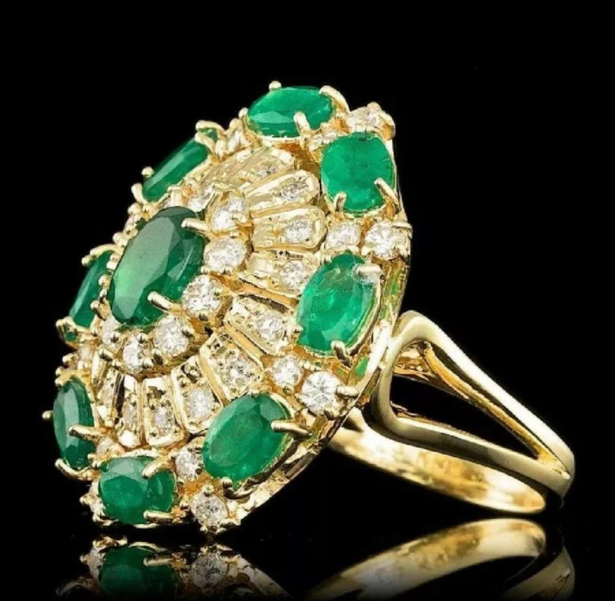 Certified 6.86 Carat Emerald and Diamond Ballerina Ring. The ring is 14k solid gold and weights approx 16 grams. 

Main Stone: Emerald
Color: Green
Carat Total Weight: 4.87
Treatment: None
Cut: Oval 
Cut Grade: Very Good 

Secondary Stone: