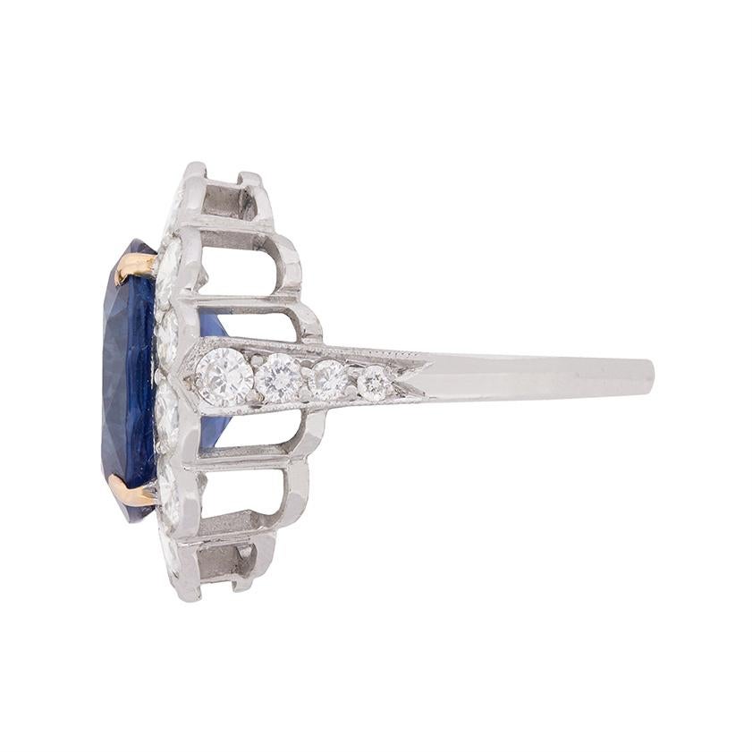 Oval Cut Certified 7.10 Carat Sapphire & 2.40 Carat Diamond Halo Ring c.1940s For Sale