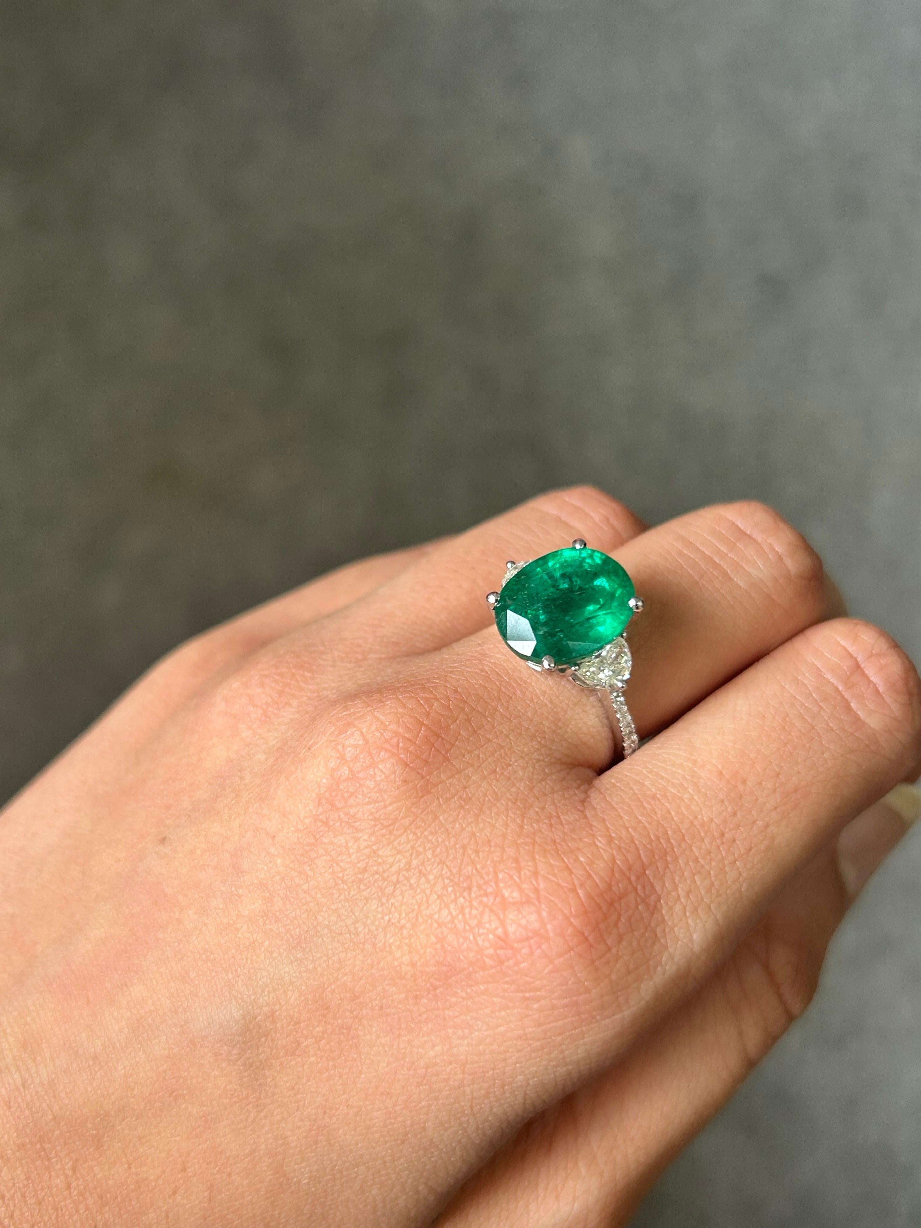 Modern Certified 7.12 Carat Emerald and Diamond Three Stone Engagement Ring For Sale
