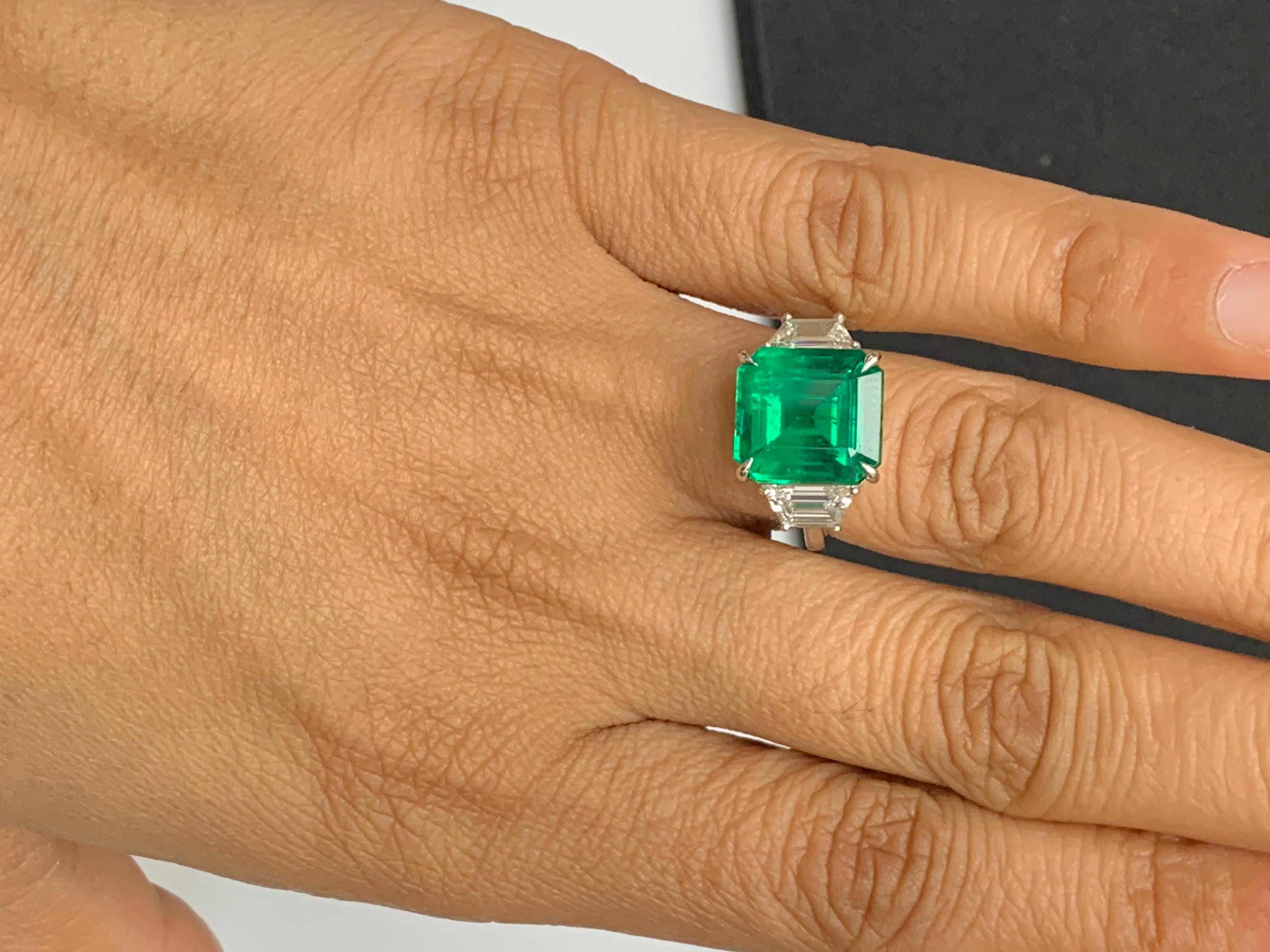 Modern Certified 7.47 Carat Emerald Cut Emerald & Diamond Engagement Ring in Platinum For Sale