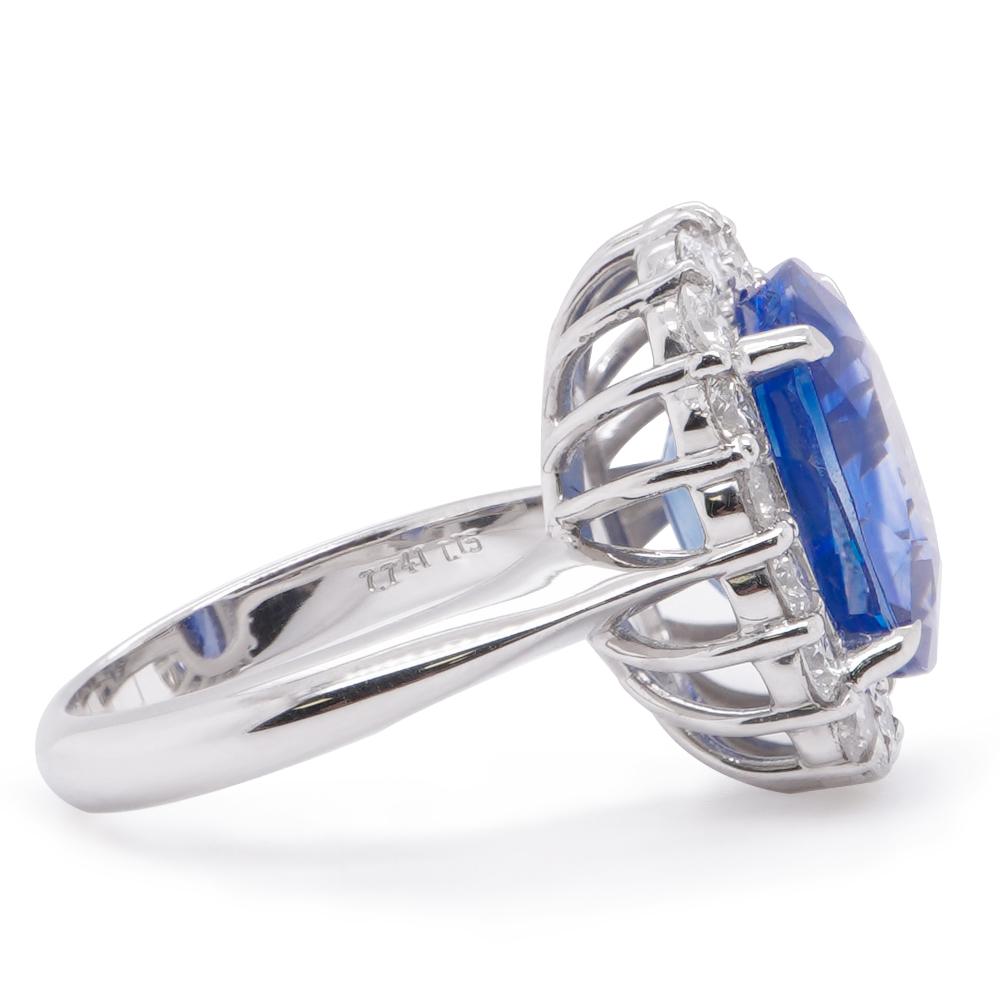 A corn flower like shade sapphire weighing 7.74 carats are set along with 1.15 carat of white brilliant round diamond. The ring is mounted in Platinum Pt 900 and the stone is certified by CGL Lab.
The details of the diamond are mentioned