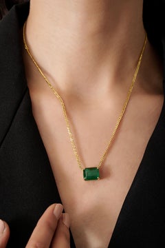 Collana con ciondolo solitario di smeraldo verde taglio ottagono certificato da 7,7 carati in oro 14K