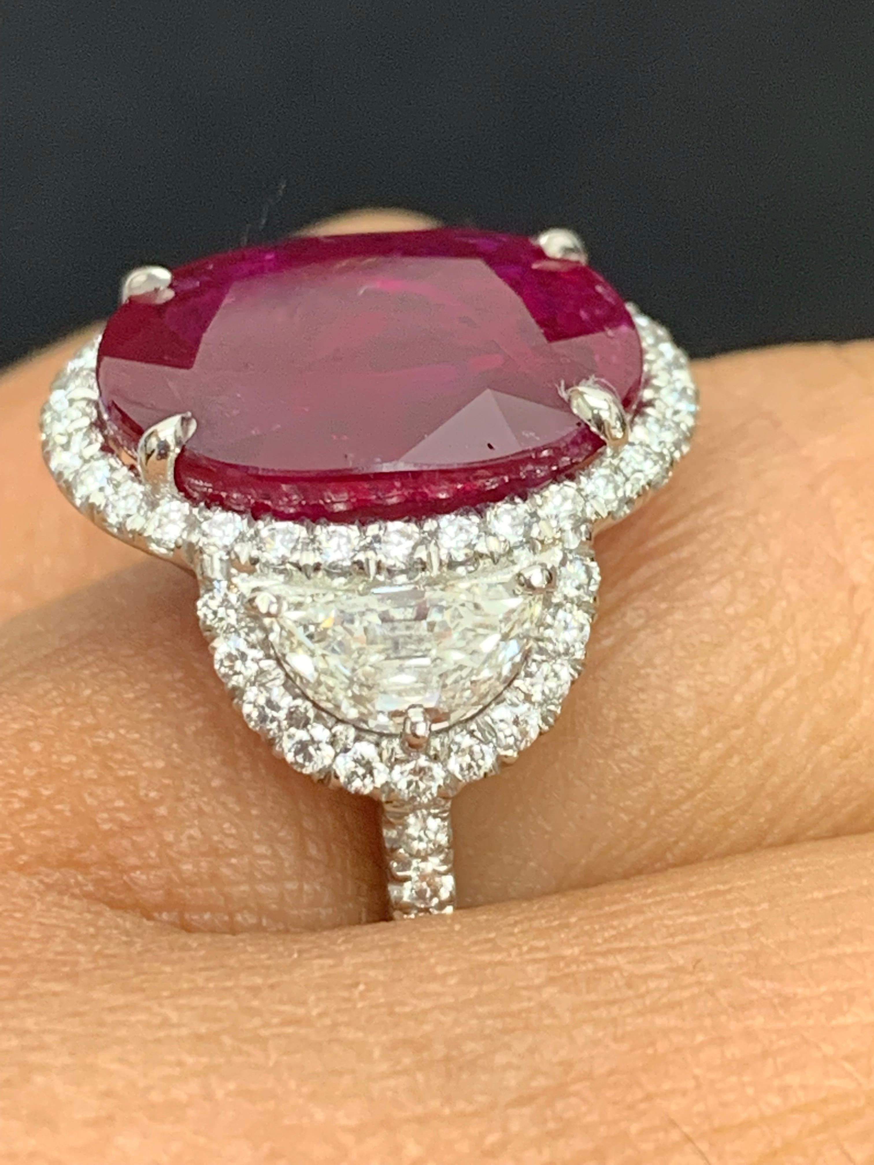 Modern Certified 8.02 Carat Oval Cut Ruby and Diamond Three-Stone Halo Ring in Platinum For Sale