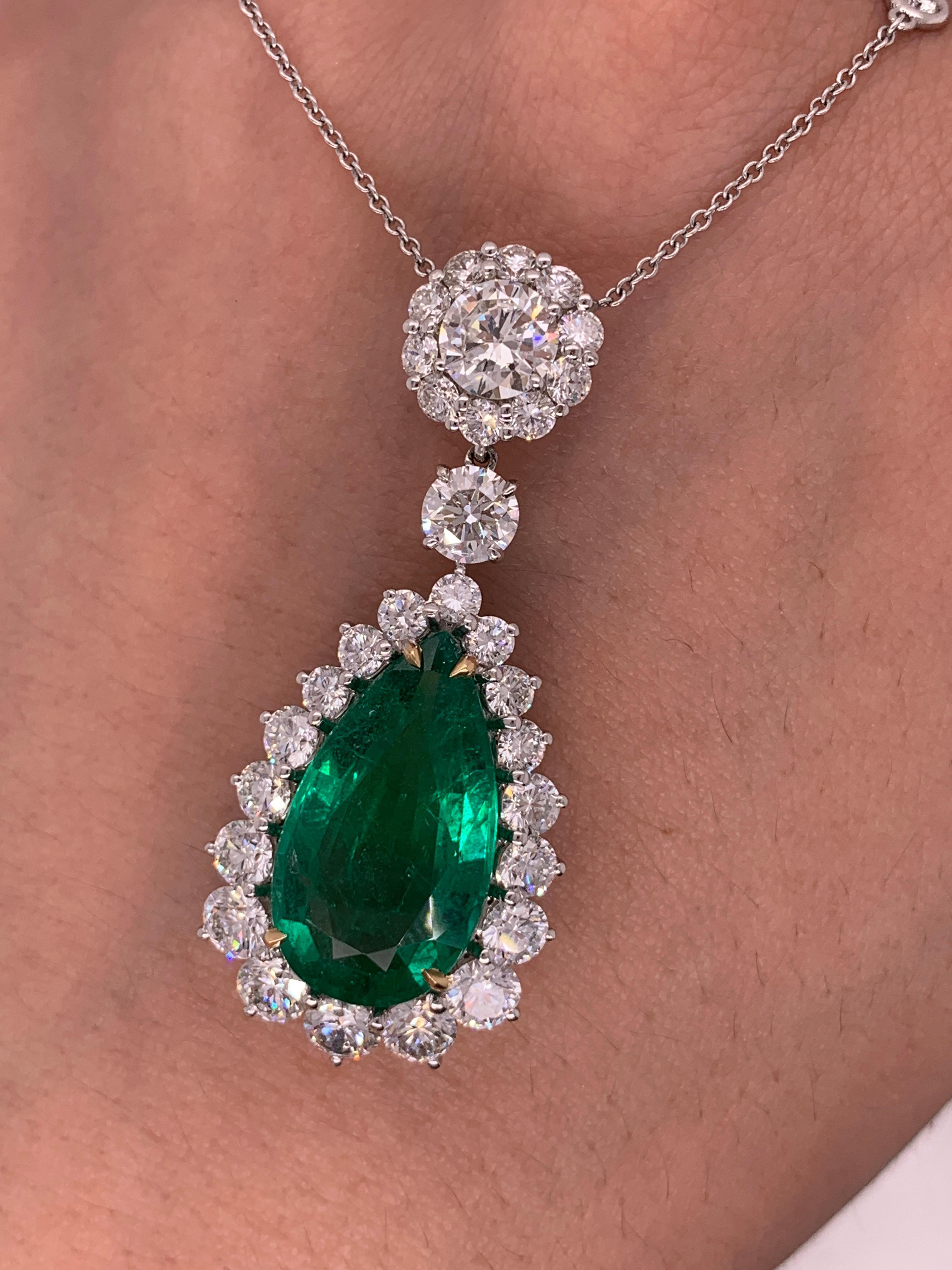 Elegant Pear Shape Green Emerald and Diamond Pendant

The center stone is 8.58 Carats Zambian Pear Shaped Emerald, certified by Swiss Lab.

Surrounded by 5.10 Carats of round brilliant cut diamonds, on diamond by the yard necklace

