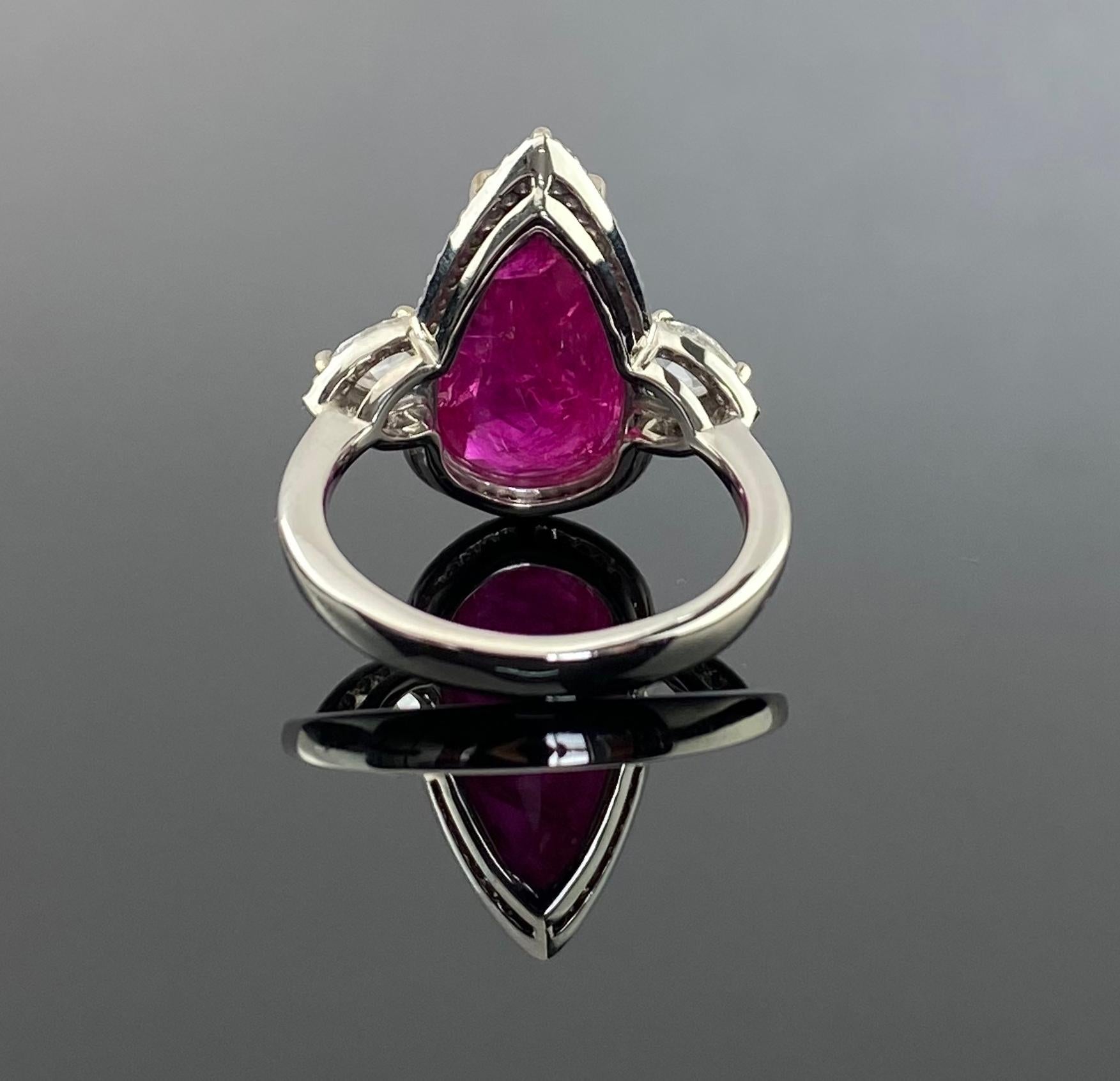 Pear Cut Certified 8.8 Carat Ruby and Diamond Three Stone Engagement Ring For Sale